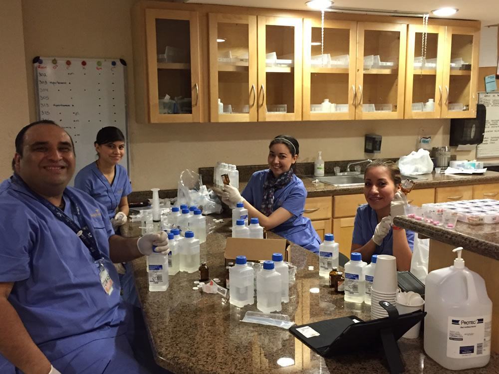 Early morning shift. The nurses prepare Vit C and B17 infusions for all the patients today