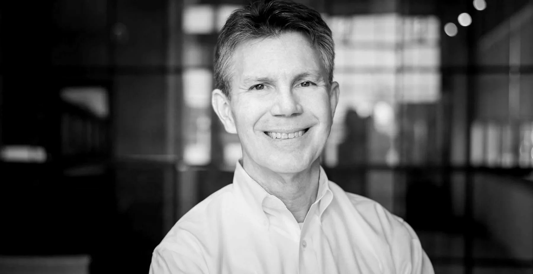 black and white headshot of Scott Dedmon