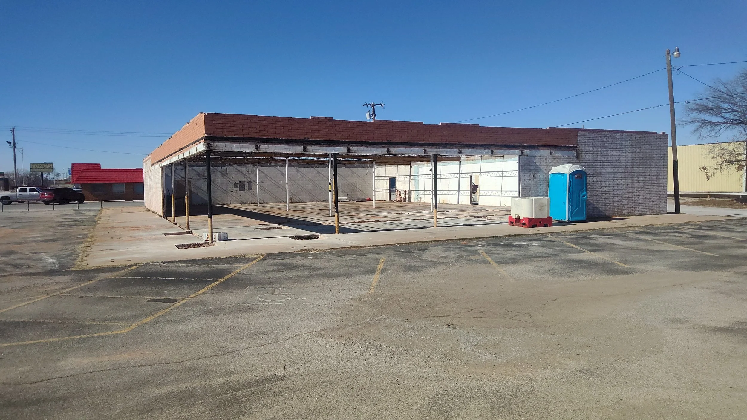 The Walter's building pre-renovation, showing the gutted interior and blank boxy exterior.