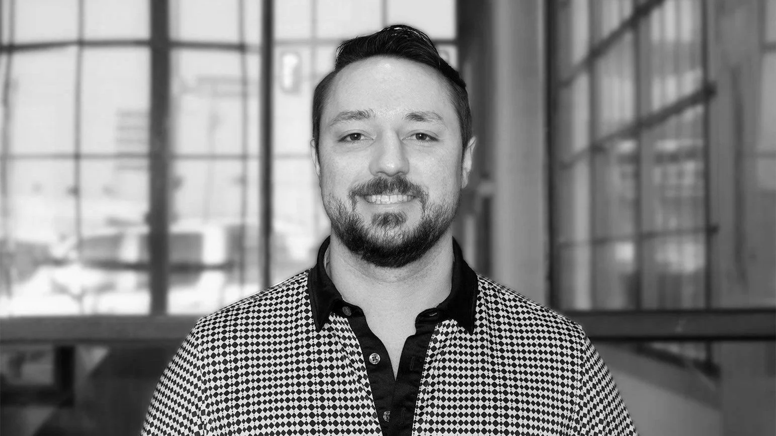 a black and white photo of Doug Kapple, Construction Administrator
