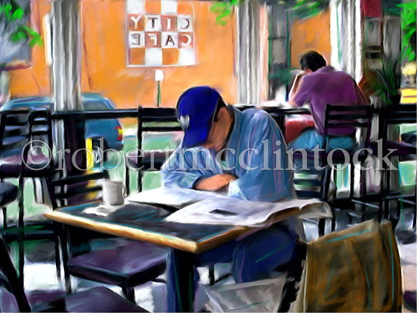 city-cafe-guy-reading.jpg