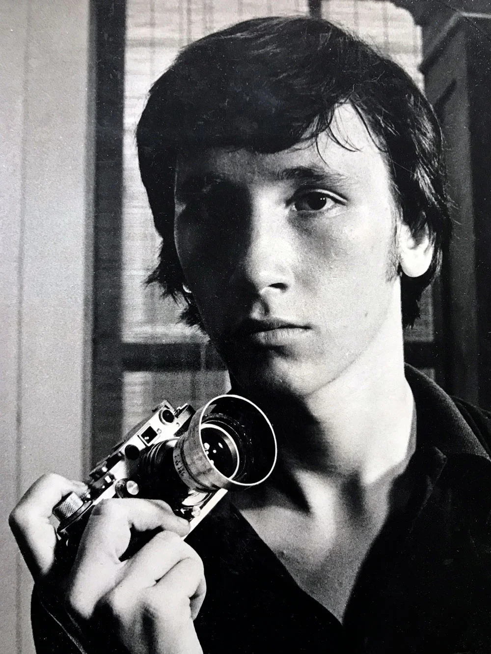 The boy photographer with grandfather’s Leica IIIs
