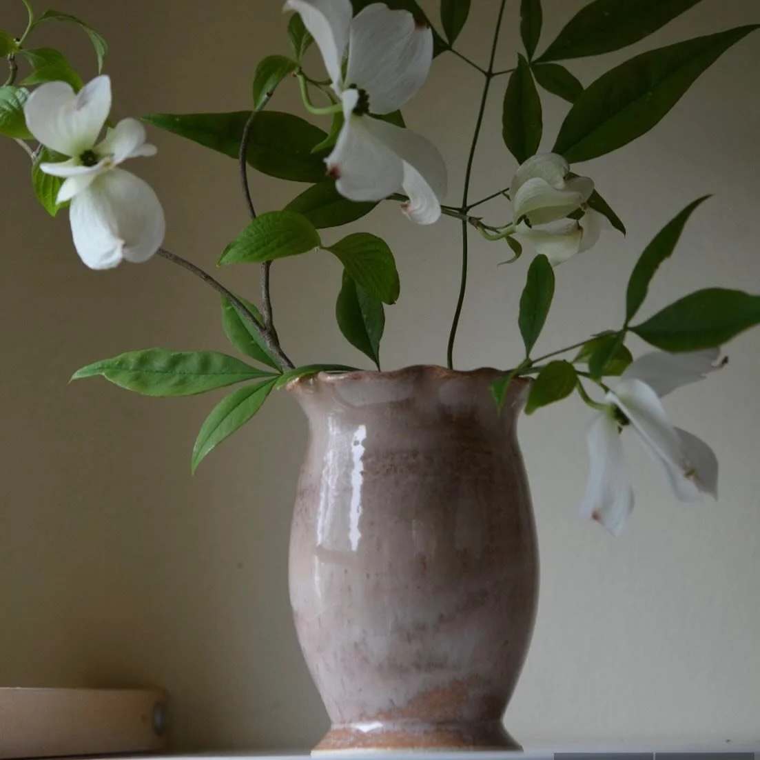 Our dogwood tree is in bloom and I used a branch to decorate some images for pieces I just added to my Etsy shop. Please go check out my new vases and items and let me know what you think!

https://www.etsy.com/shop/EmilyBeckerCeramics