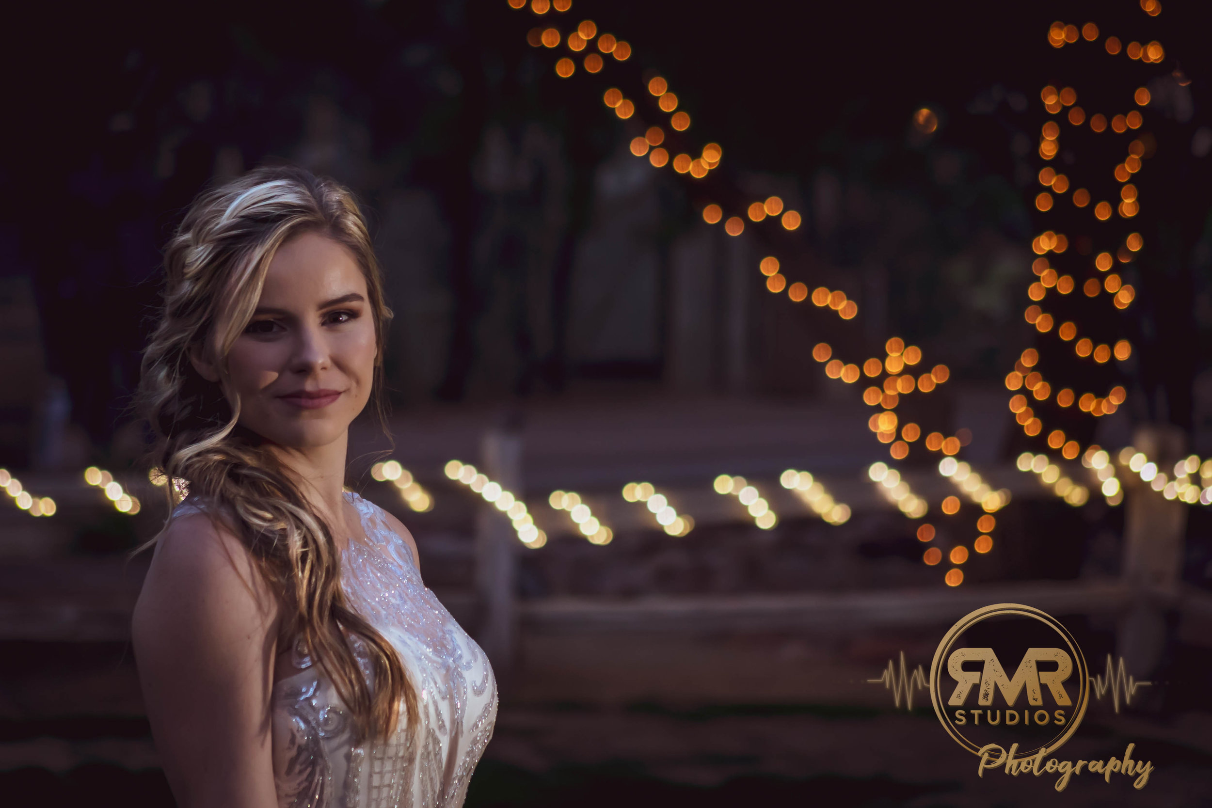 Bride 2 in front of light tree.jpg