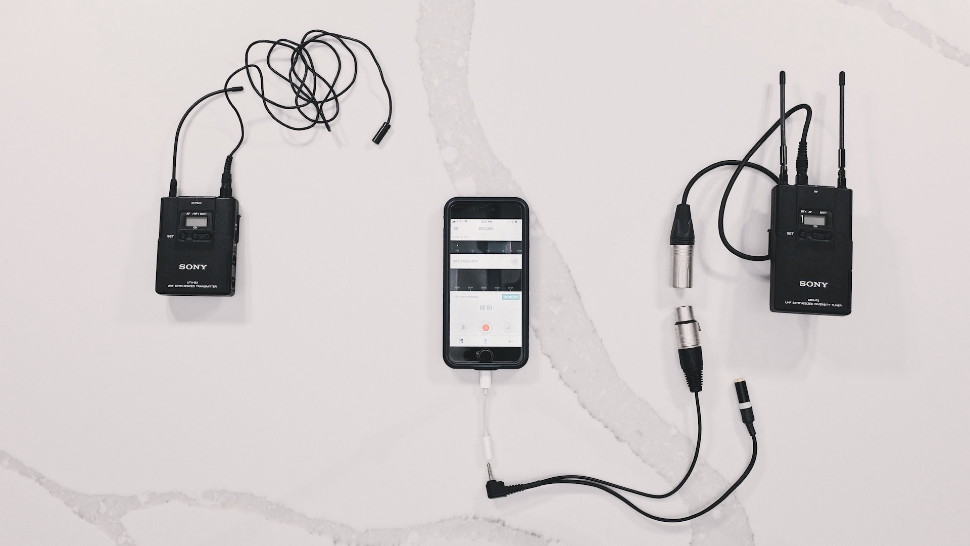 Connecting a wireless lavalier microphone to an iPhone.