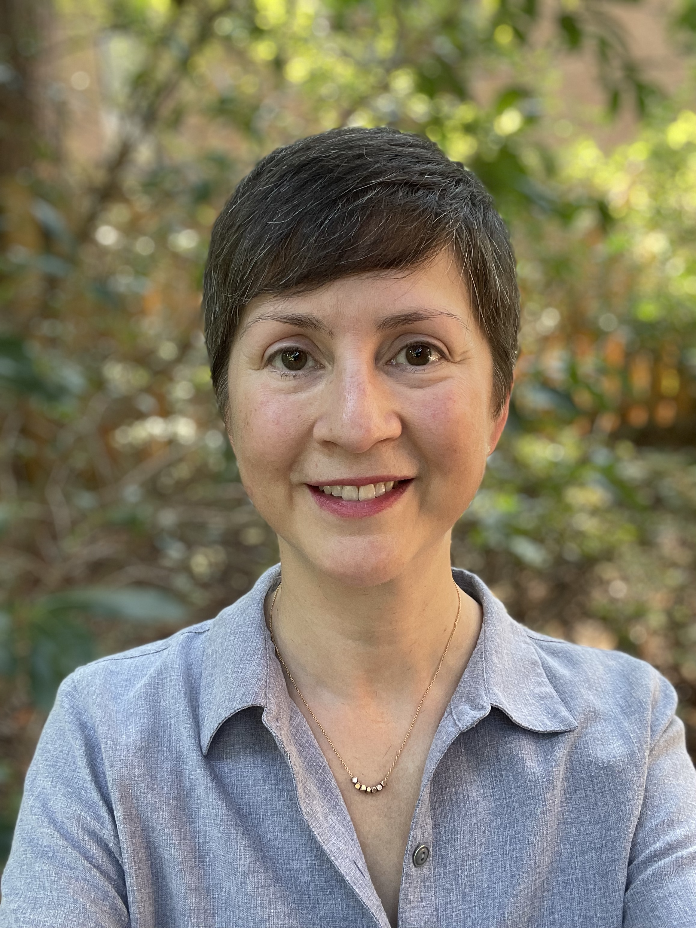 Val Evanoff_AICC Headshot.png