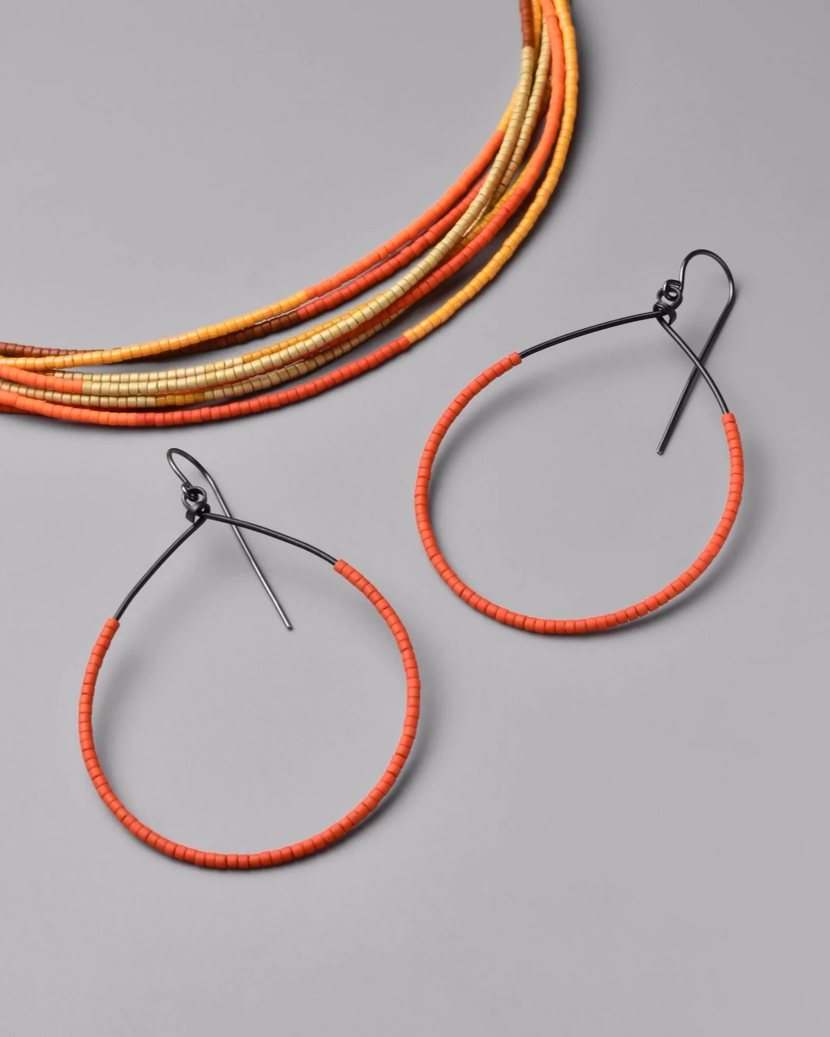 Tura Earrings - Saturn Sweep Necklace - Secondary.jpeg
