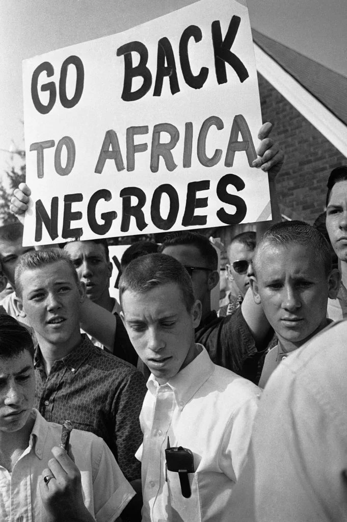 This photo from the Civil Rights era captures the essence of Trump’s “Send her home” meme. Anyone non-white should go “home,” he is signaling. (Photo: origin unknown)
