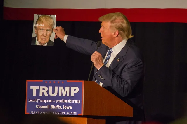 Donald Trump stares at a photo of himself ( Matt Johnson )
