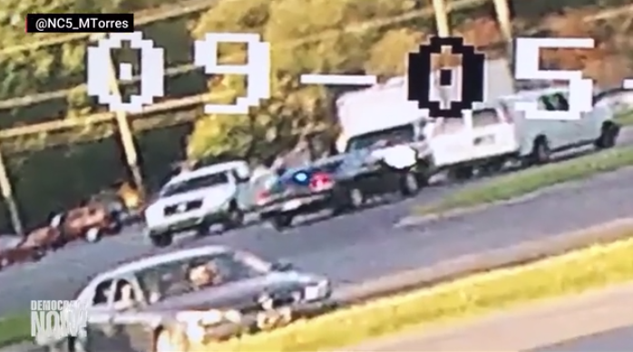 Security footage from the scene ( Democracy Now! )