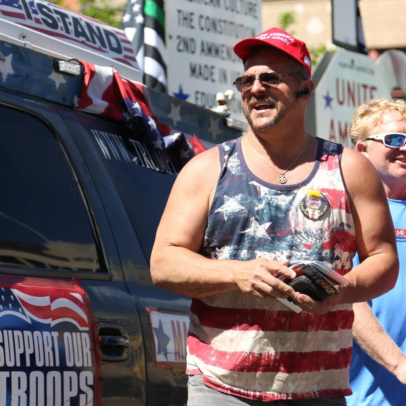 Rob Cortis hands out flyers. (Photo Credit: GA Media Productions )