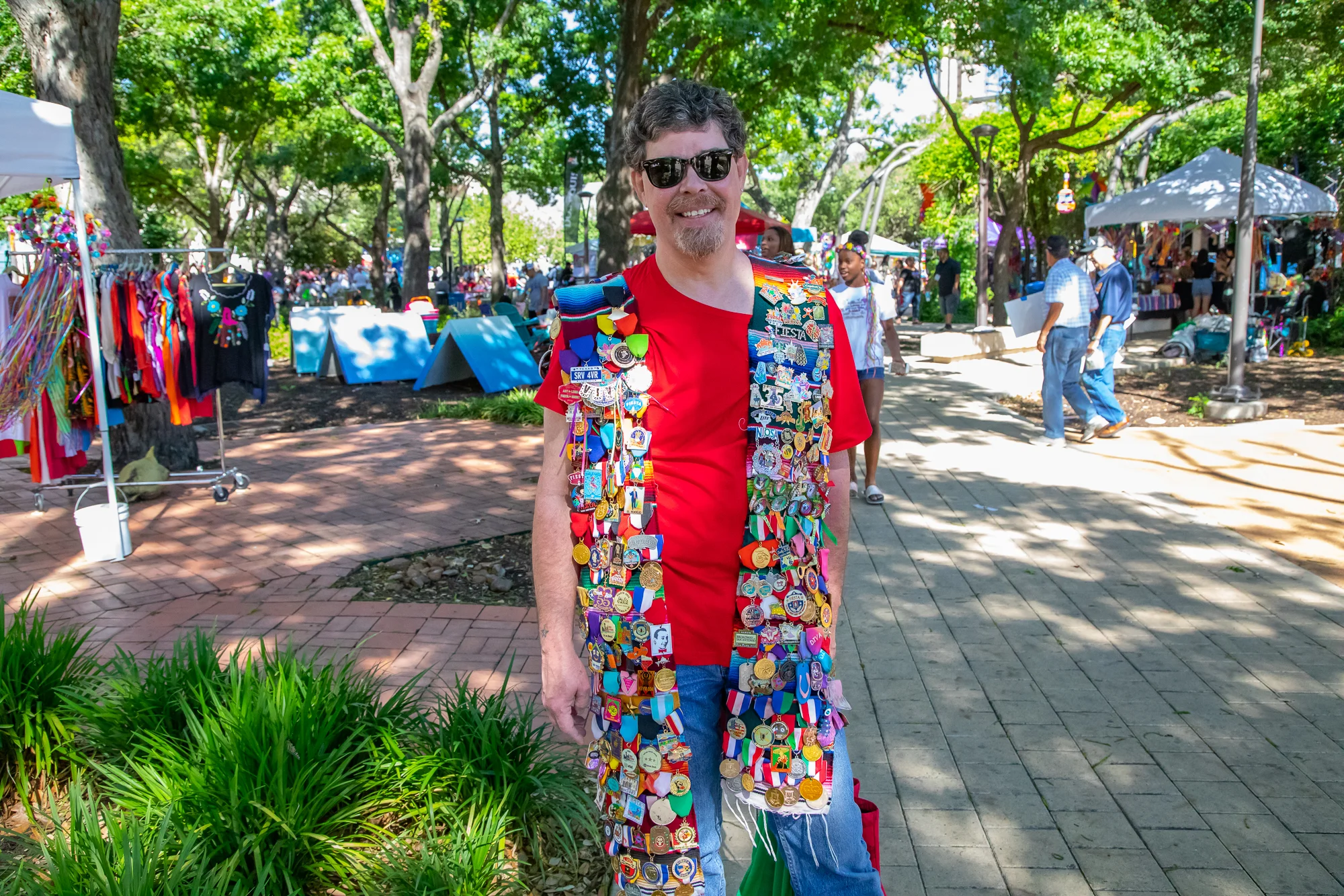 Phil Darrah showing off his medal collection. (Photo by: Joel Pena - SA Sentinel Photographer.)
