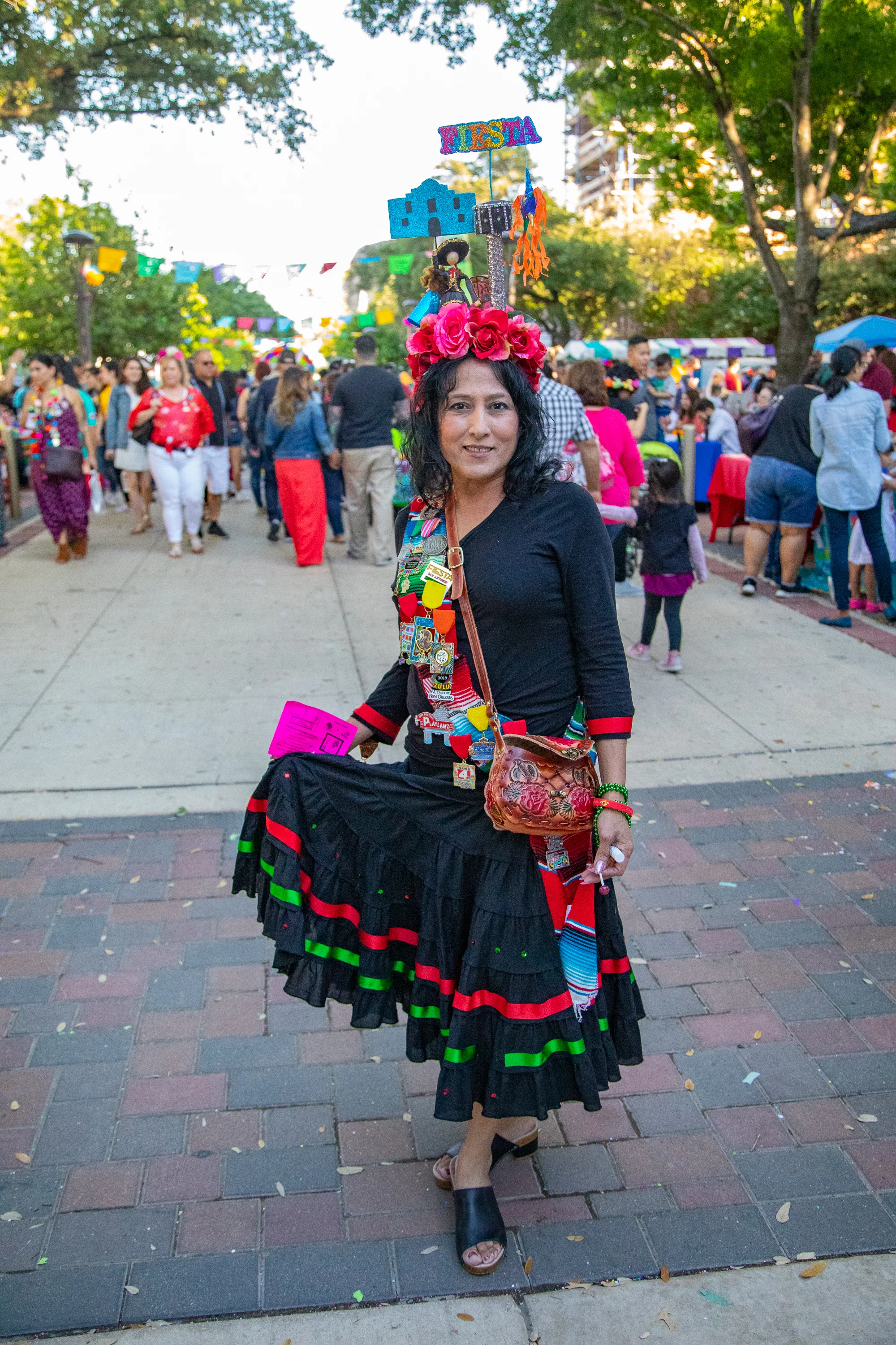 Sandi Estrada in her festive Fiesta attire. (Photo by: Joel Pena - SA Sentinel Photographer.)