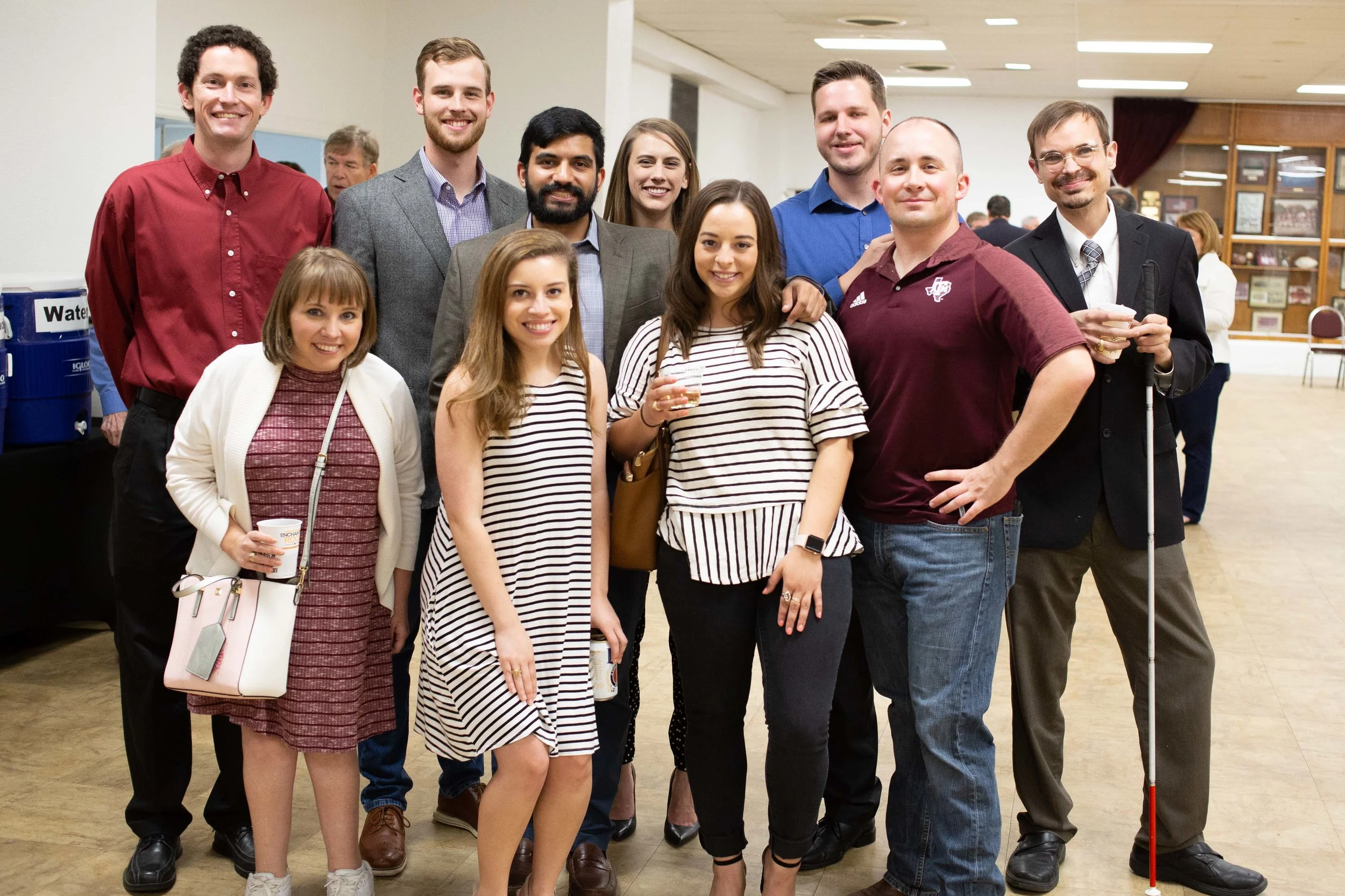 Texas A&M Former Students pose for a photo after the Muster ceremony. (Photo by GA Media Media Productions .)
