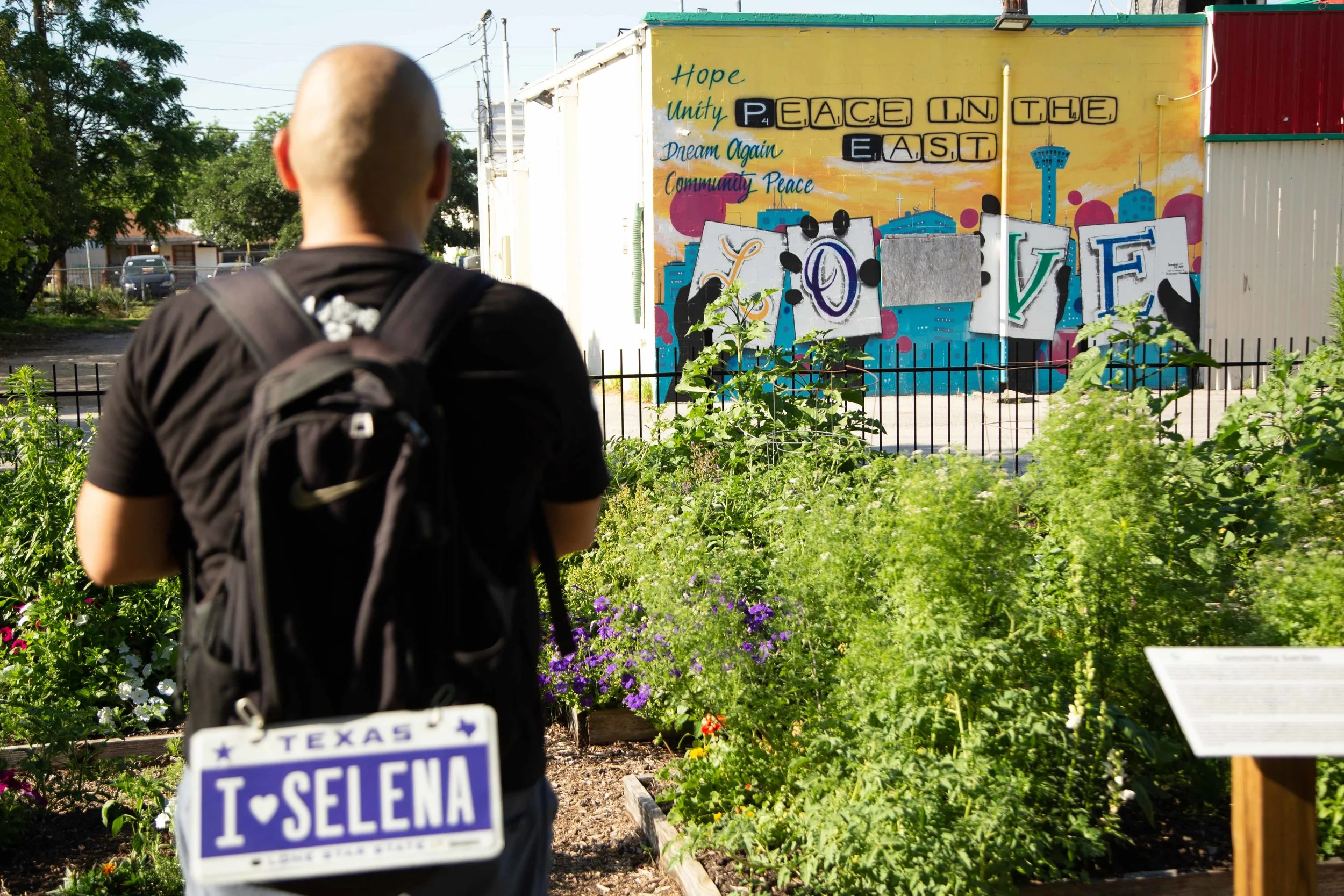 David Lamas admires the “Peace in the East” mural next to Gardopia. (Photo by GA Media Productions .)