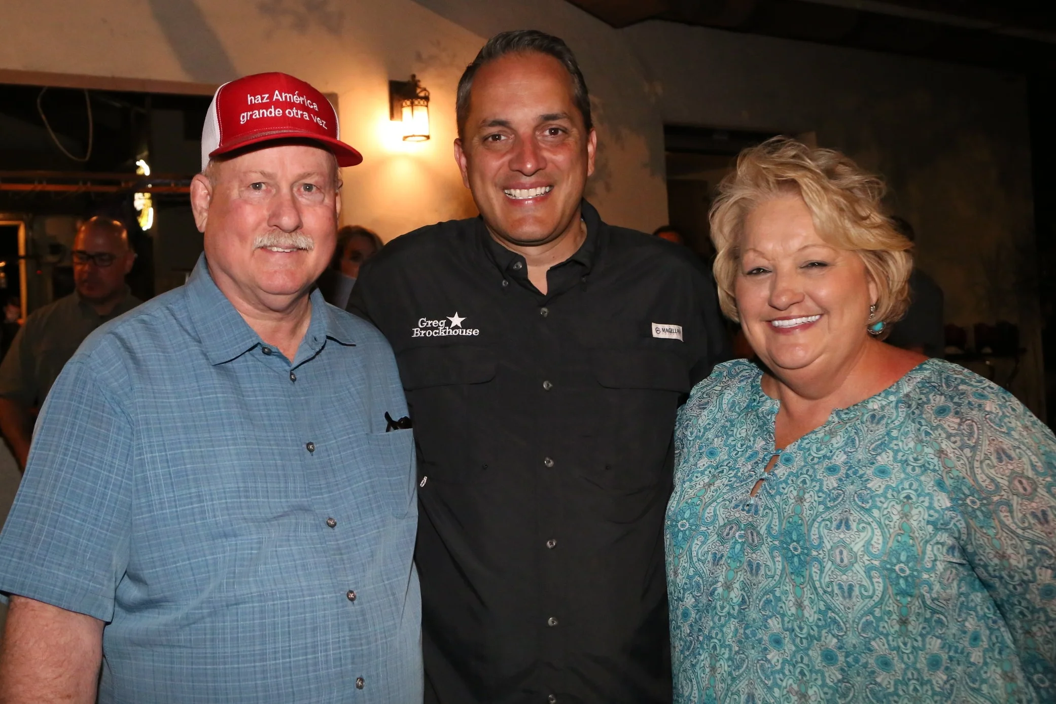 Councilman Brockhouse poses with supporters. (Photo by Jonathan Guajardo .)