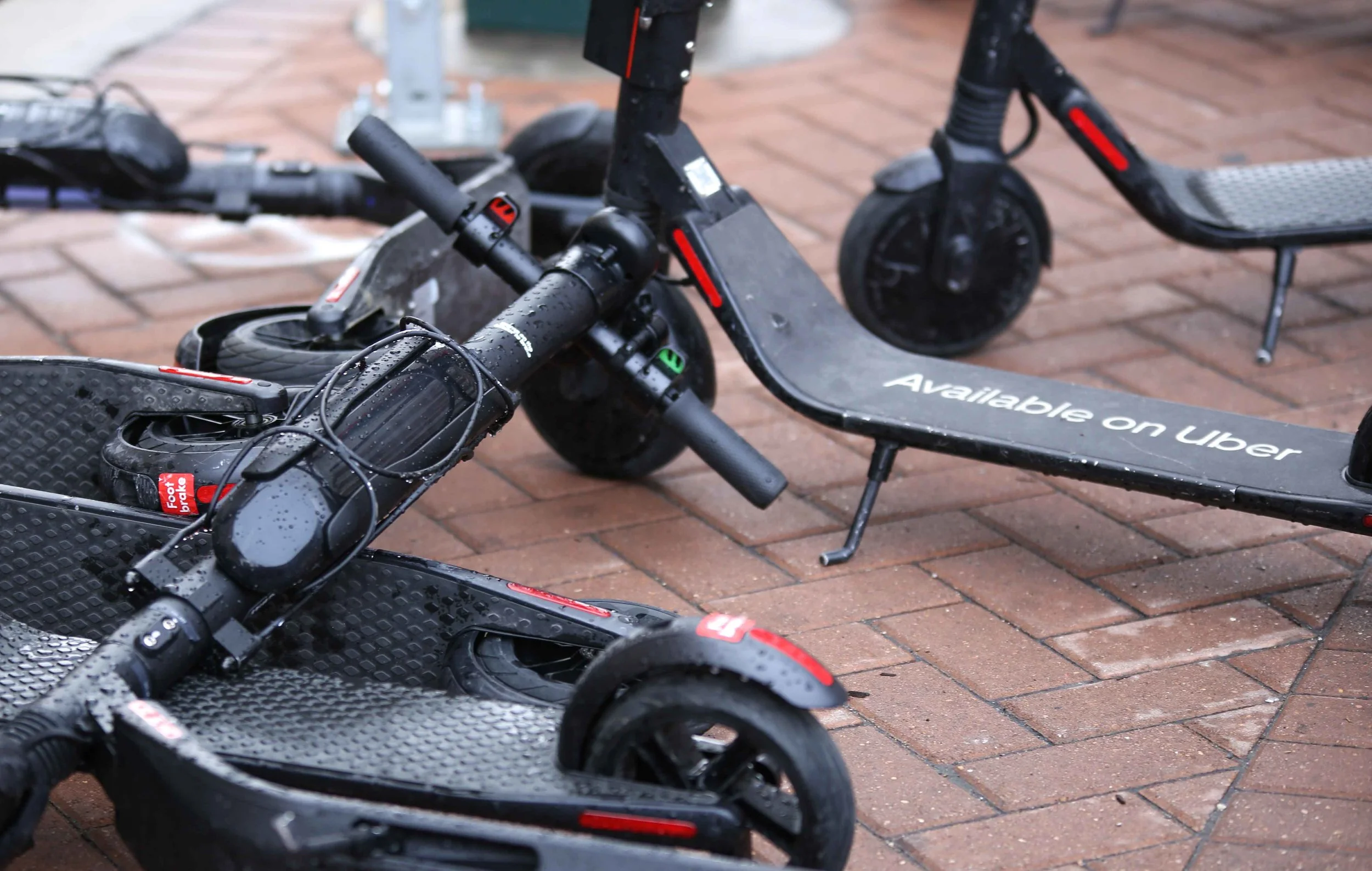 Scooters lie mangled on the sidewalk in front of the Rand Building downtown. (Photo by Jonathan Guajardo - Editor, SA Sentinel)
