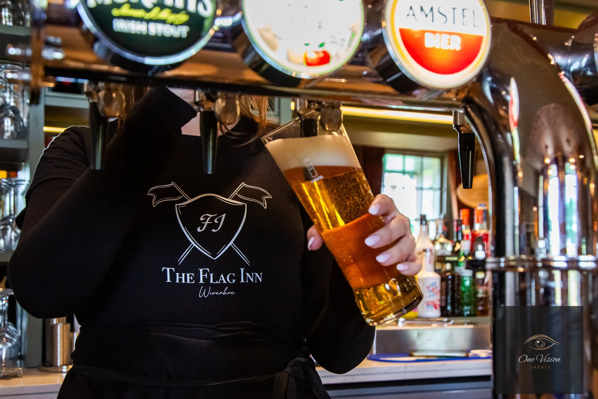 The Flag, Wivenhoe, Colchester - Bar Staff Pulling Pint.jpg