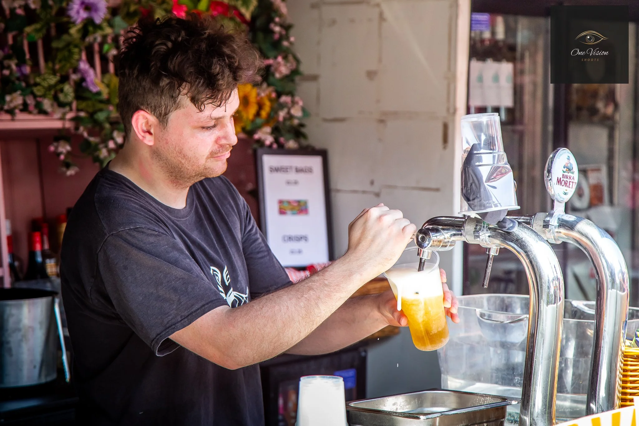 The Angel & Harp, Great Dunmow, Barman pulling a Pint-1.jpg