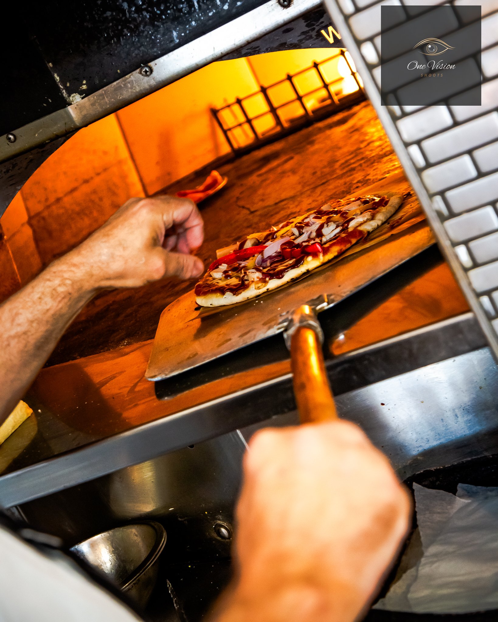 The Angel & Harp Public House, Pizza Oven, Cooking a Pizza.jpg