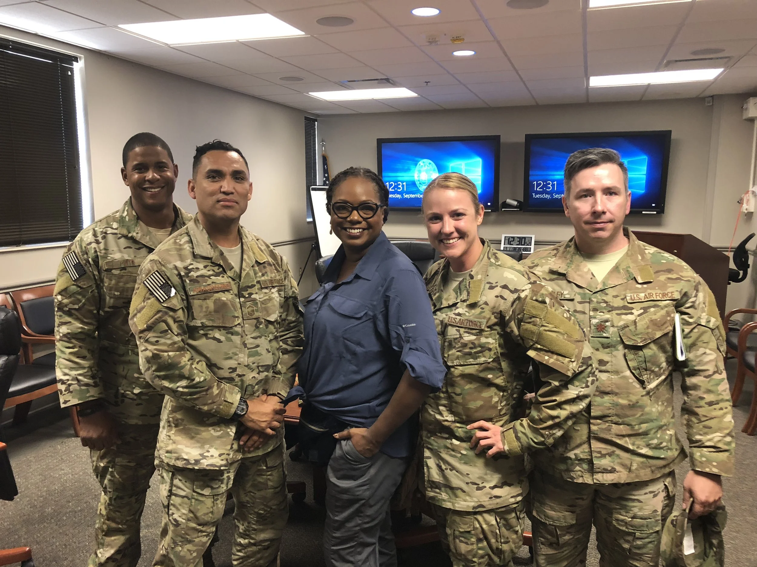 Host Wendy Calhoun with Regan and members of the 720th Special Operations Surgical Team at AFSOC, Hurlburt Field, FL. 