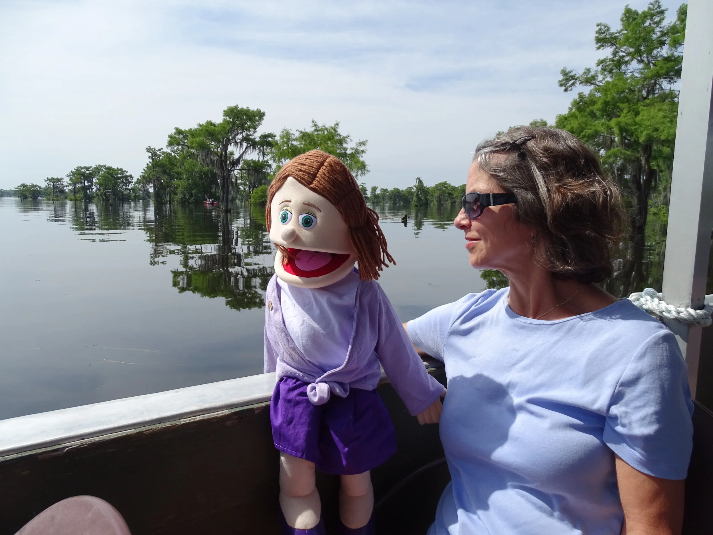  Linda and Arla check out the scenery while cruising through the Atchafalaya Swamp. 