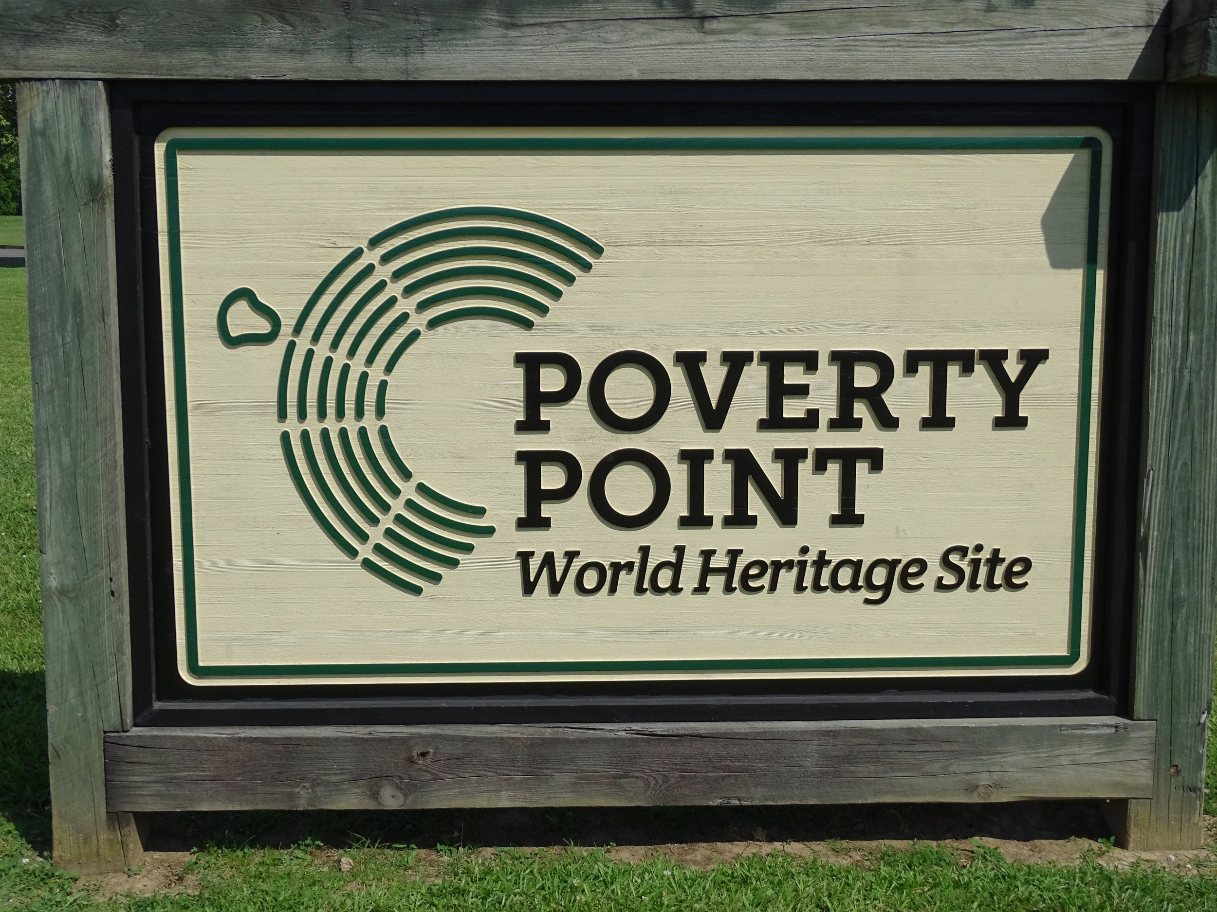 The logo on the left side of the Poverty Point sign provides a bird’s-eye view of what the site would have looked like thousands of years ago.