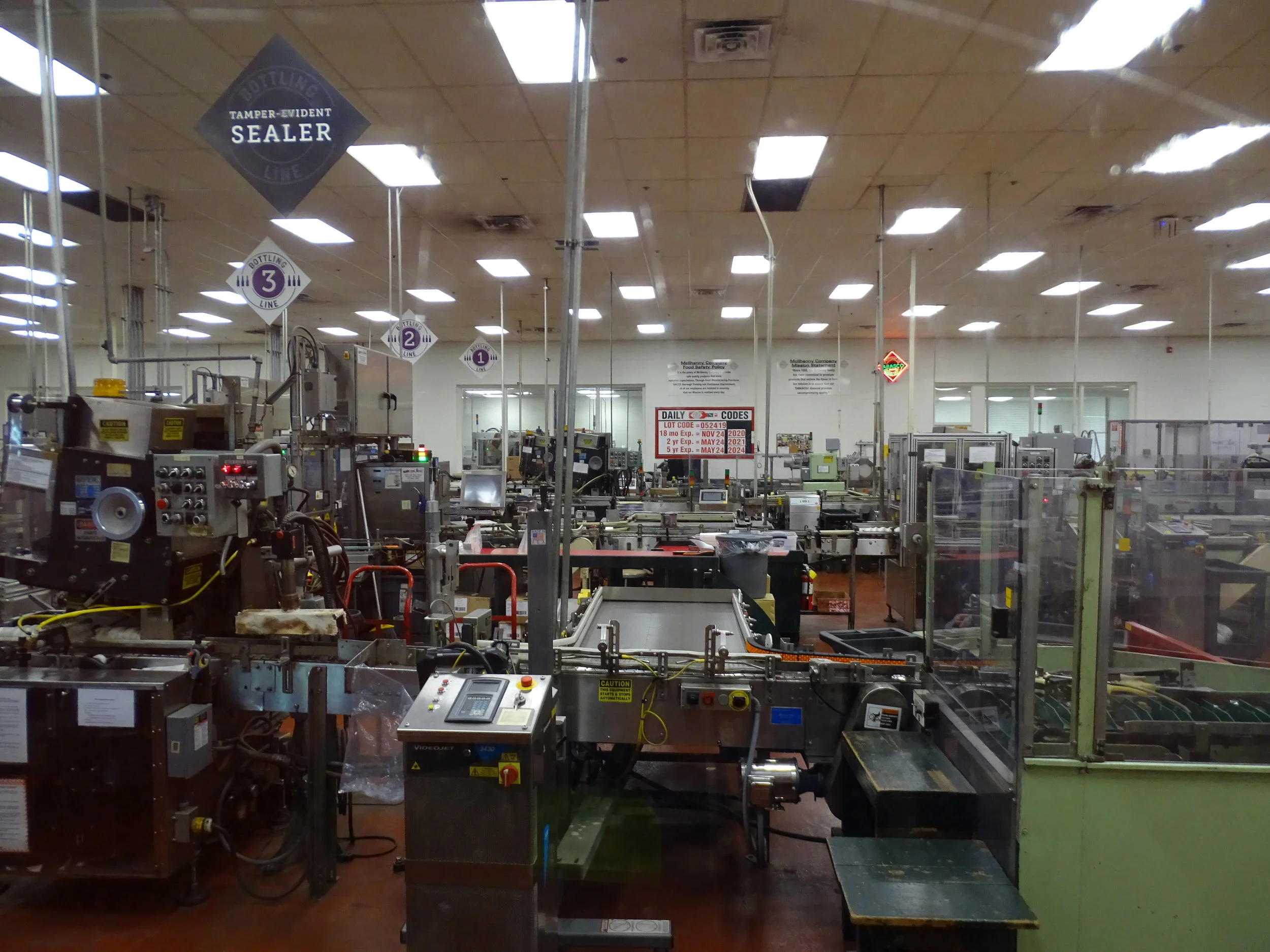 Bottling line equipment for Tabasco pepper sauce sits idle because our tour took place on a work holiday. 