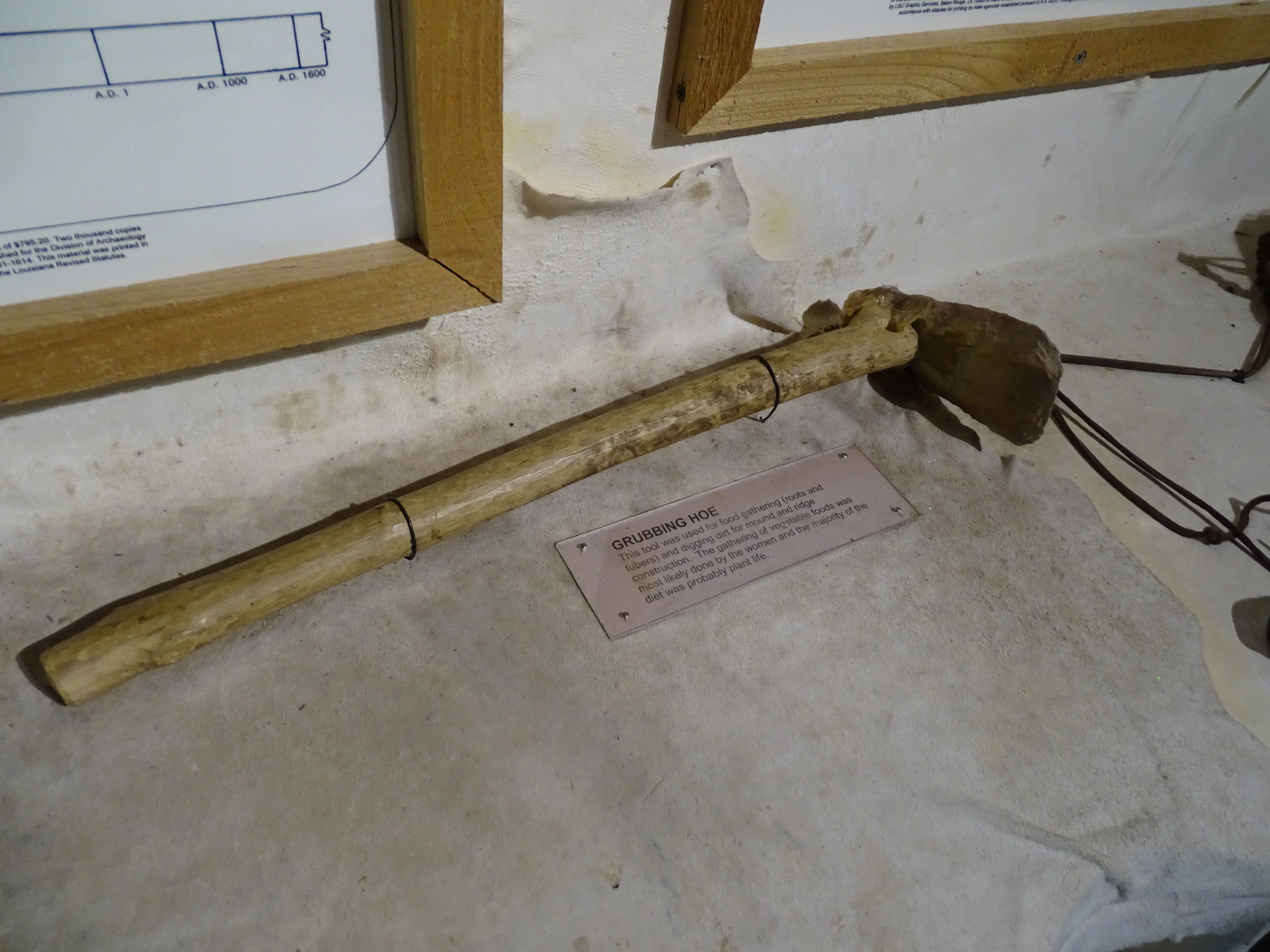 The ancient people of Poverty Point were hunters and gathers. This grubbing hoe is an example of the tools they used to collect plant life to eat.