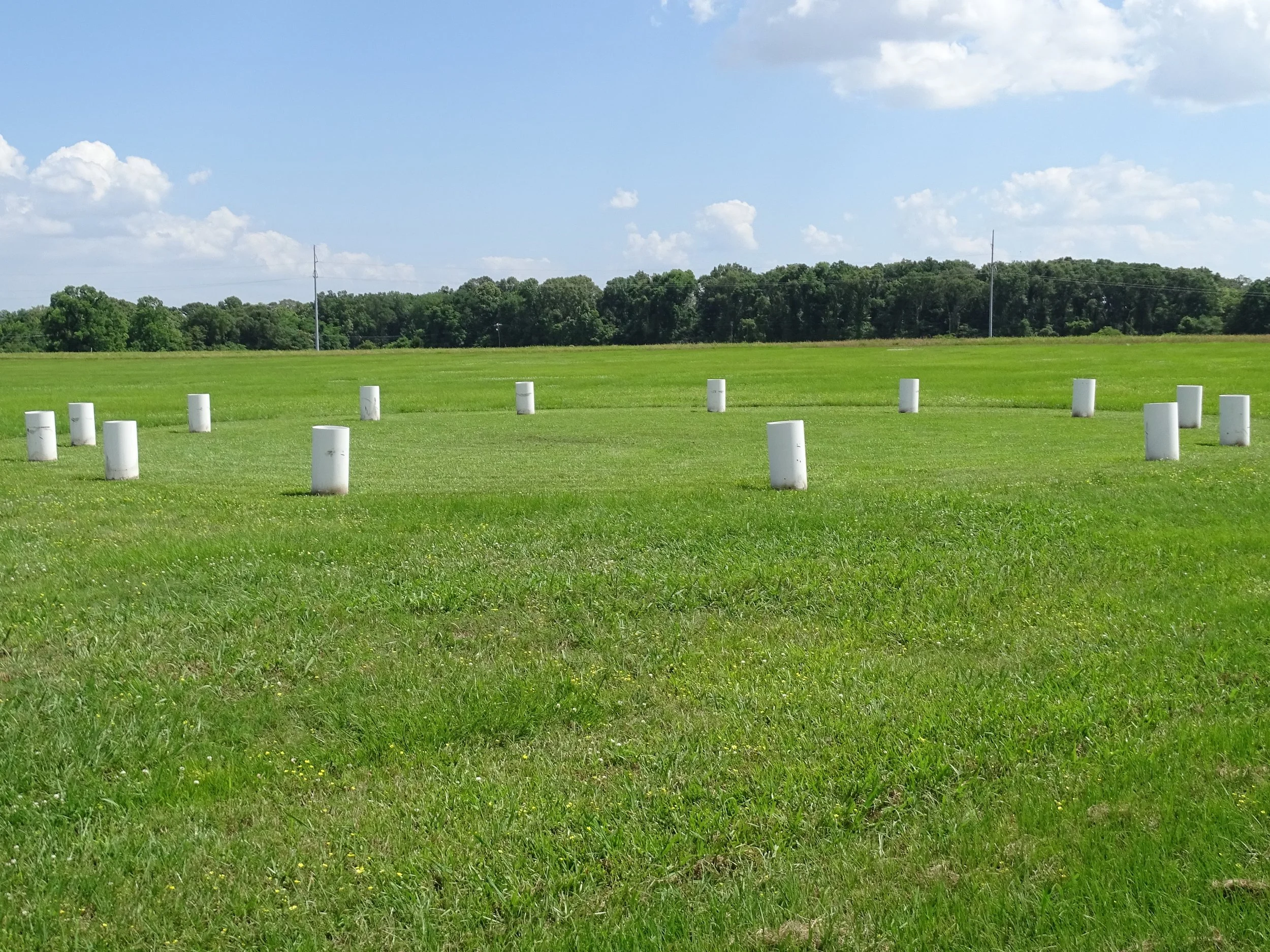 The white markers in this field indicate the boundaries of an ancient circular structure that archaeologists don’t know what purpose it had.