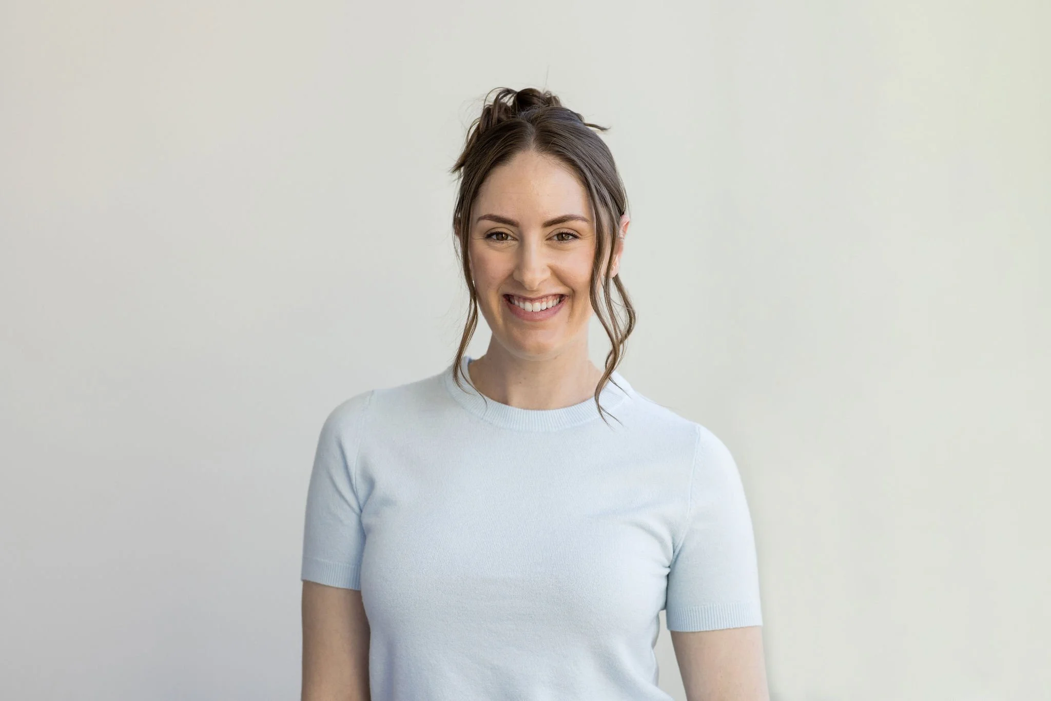 Pediatric eating disorder dietitian in a light blue shirt
