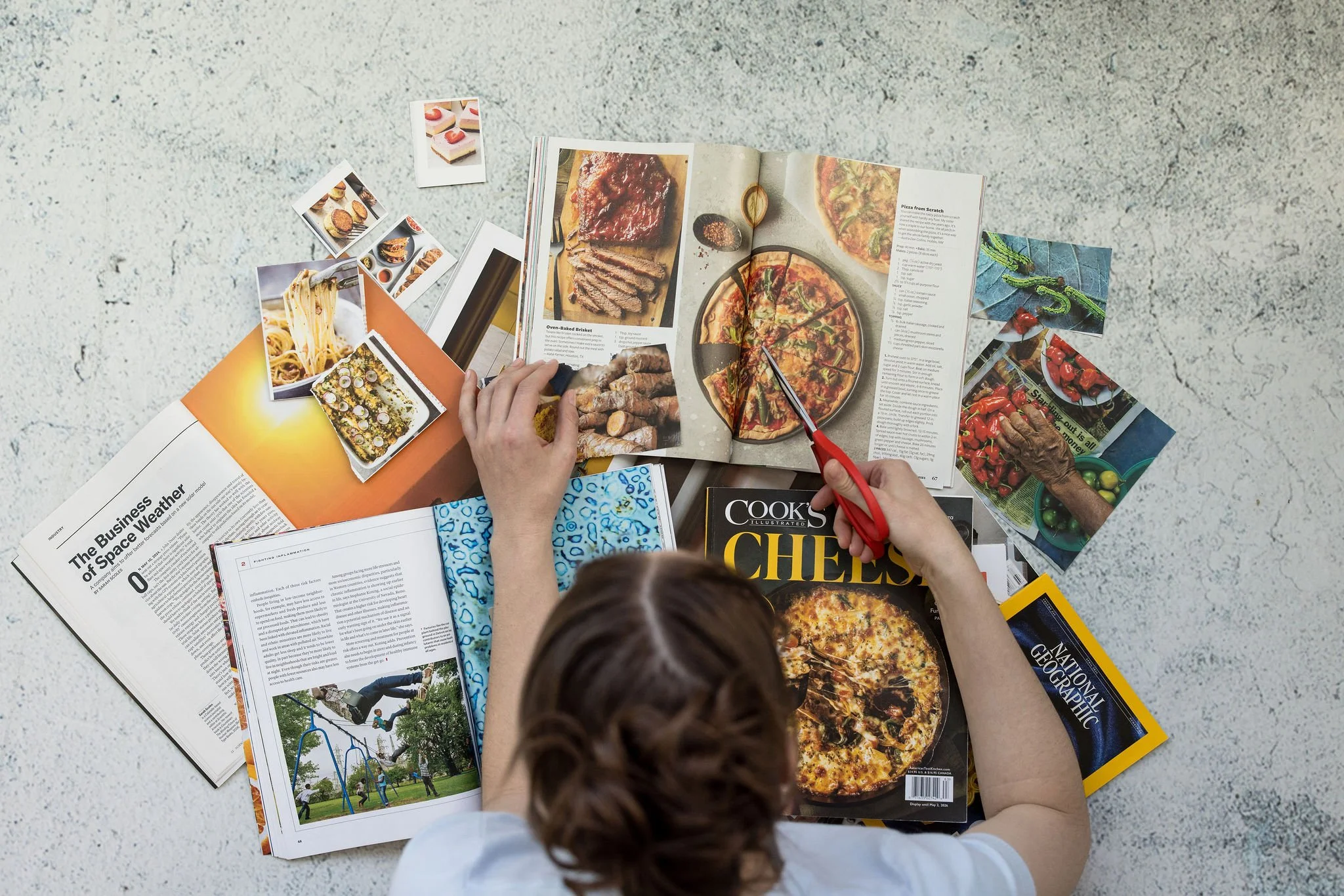 Pediatric teen dietitian with brown hair making a collage, cutting out a pizza
