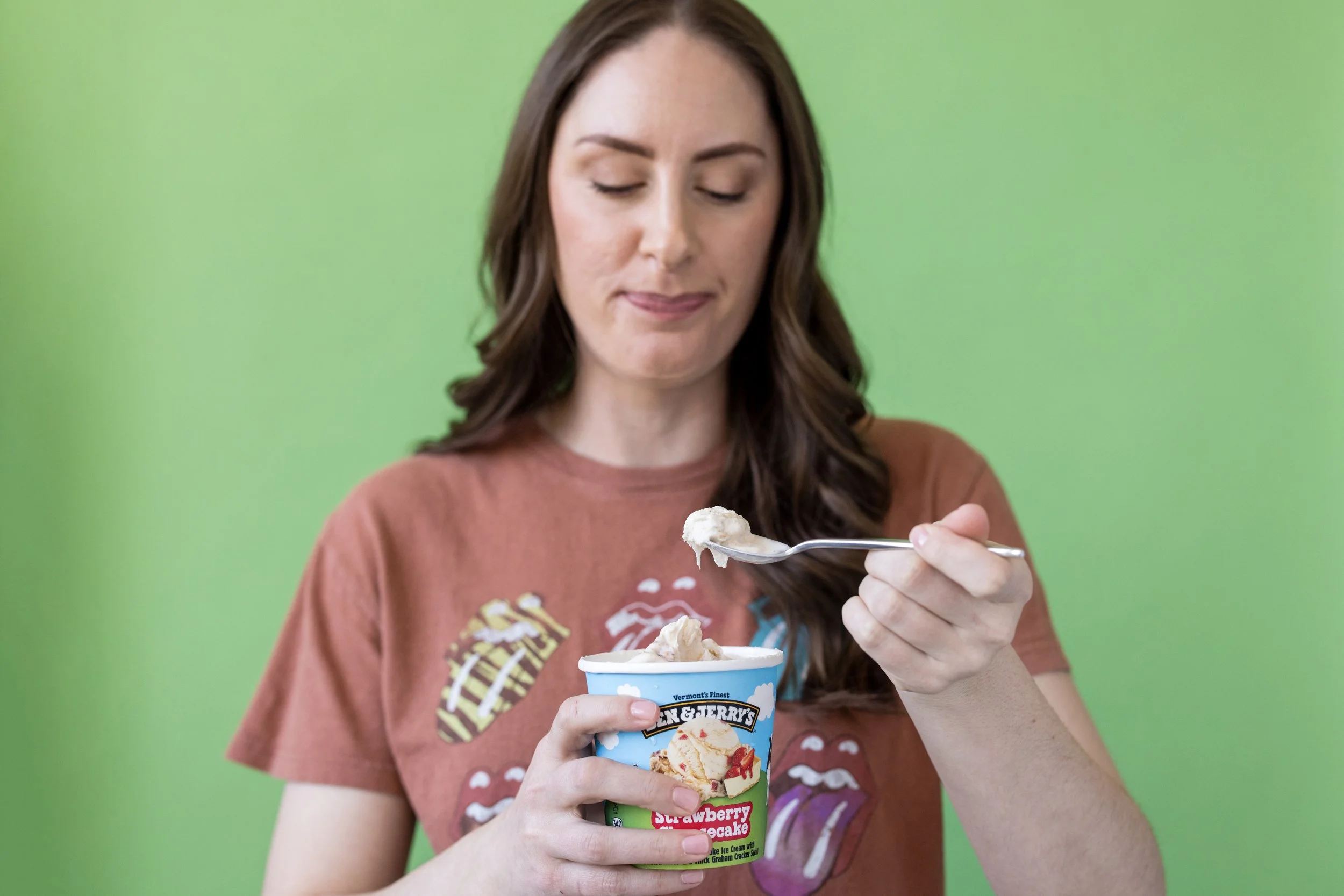 FBT dietitian in a brown shirt scooping a spoonful of ice cream