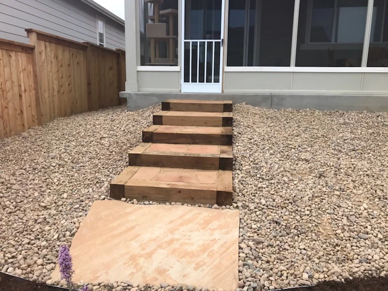 6x6 timber steps with flagstone inset landings.