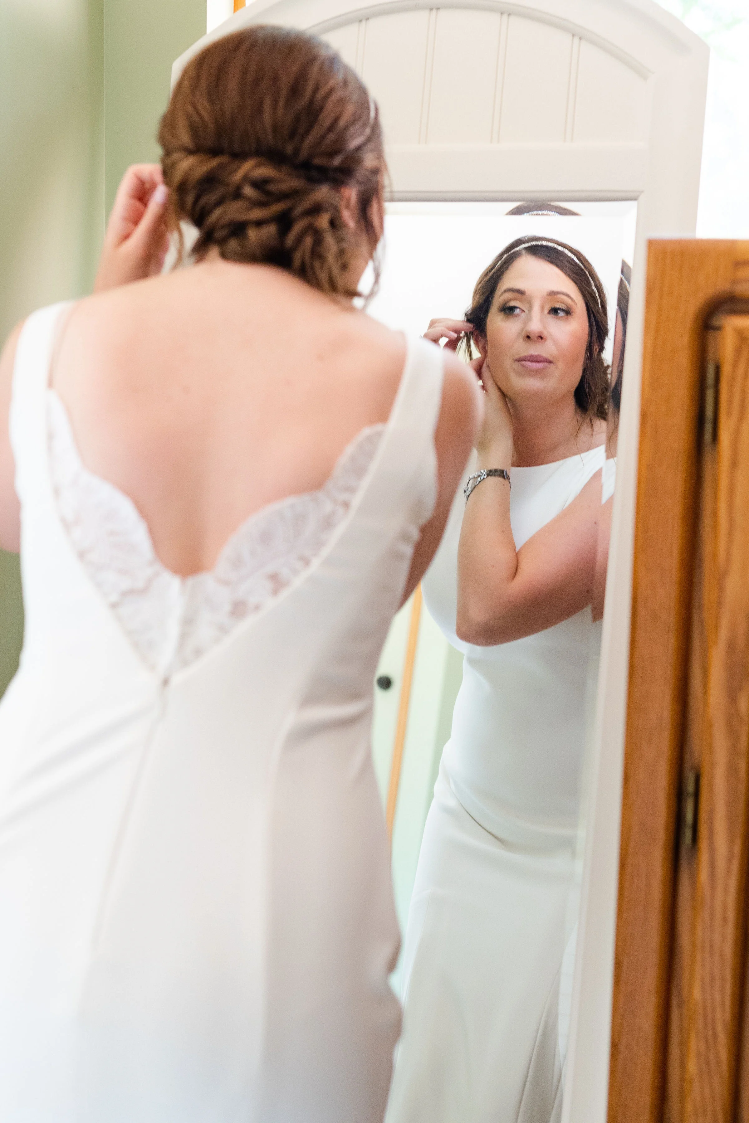 bride looking in mirror.jpg