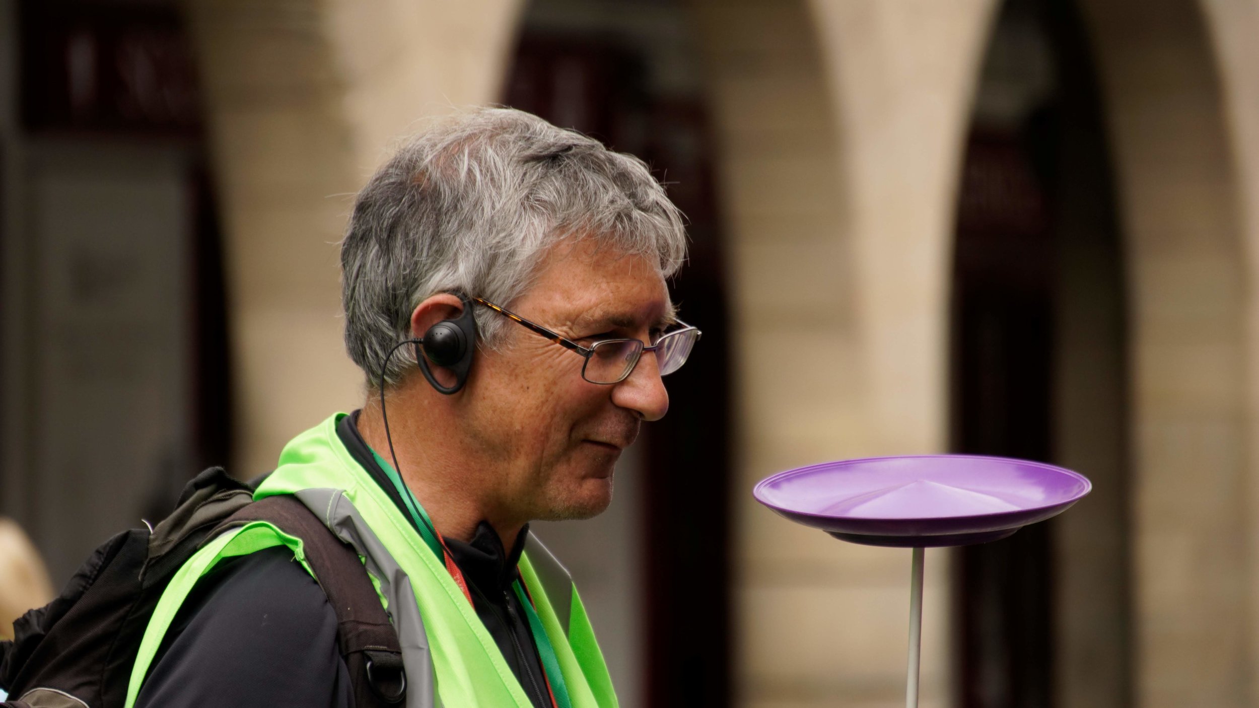 An Open Streets volunteer spinning a plate.