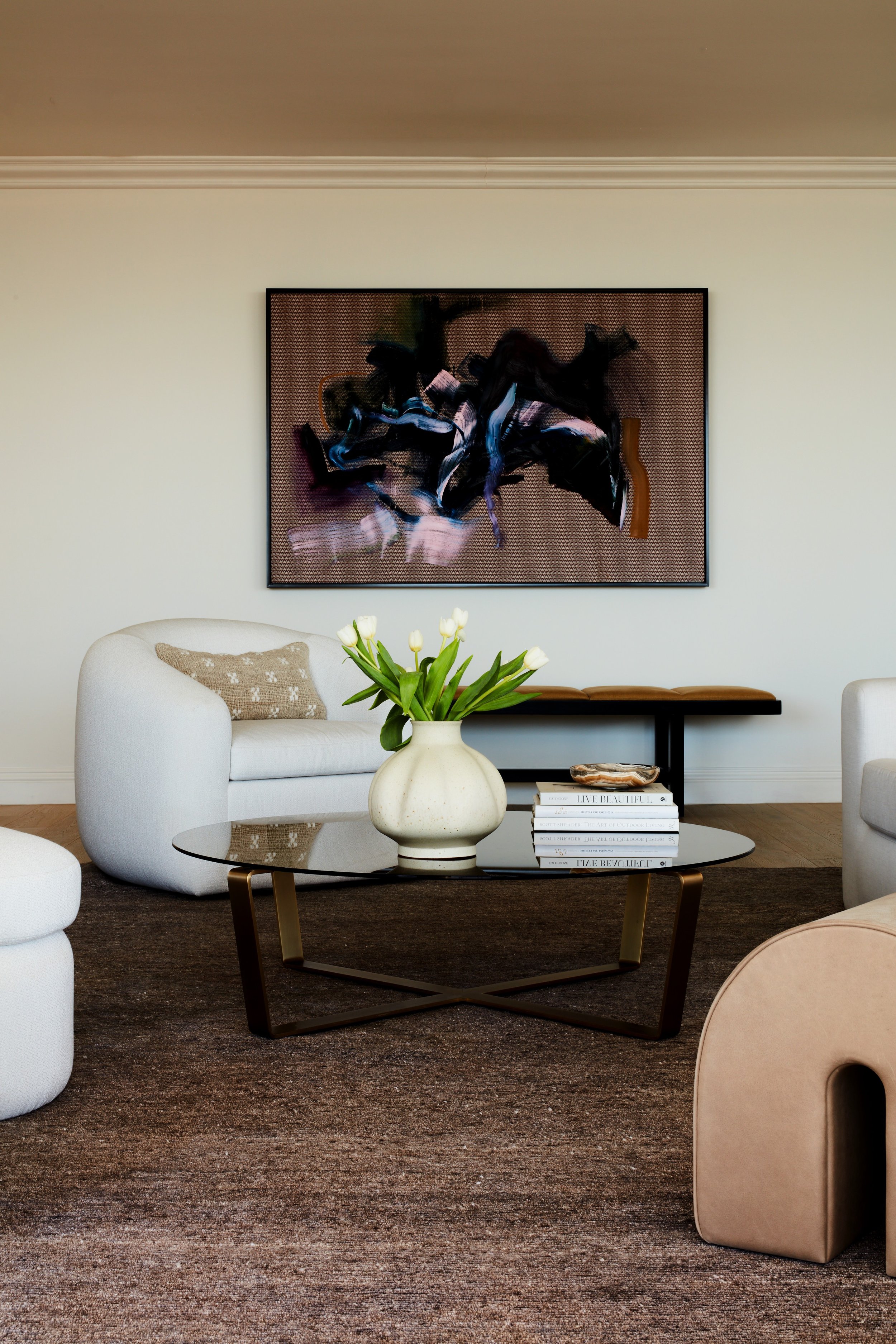 Sophisticated living room with custom furnishings, artwork, and expansive Los Angeles views.