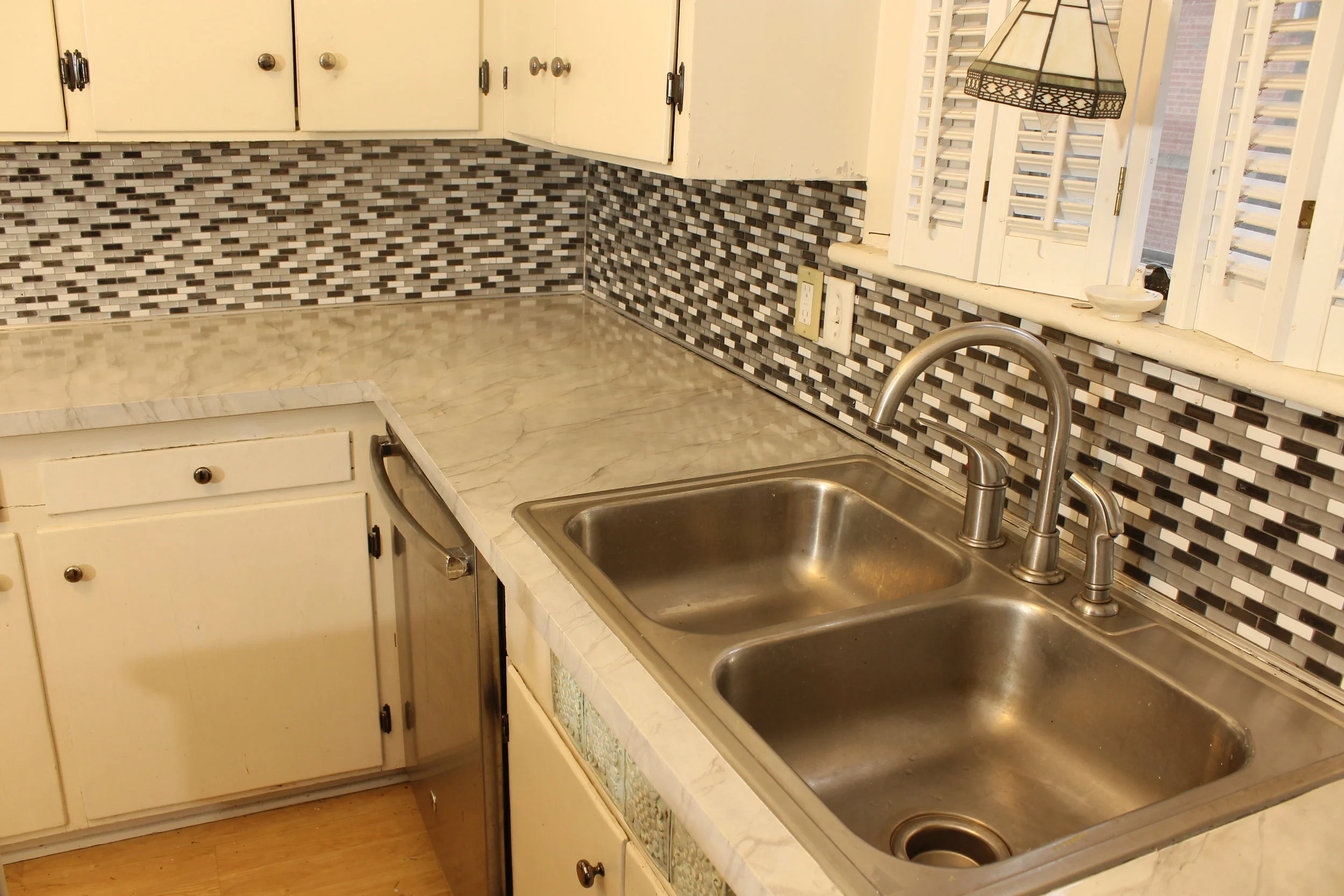  Formica counter top faux finished to look like white carrerra marble 