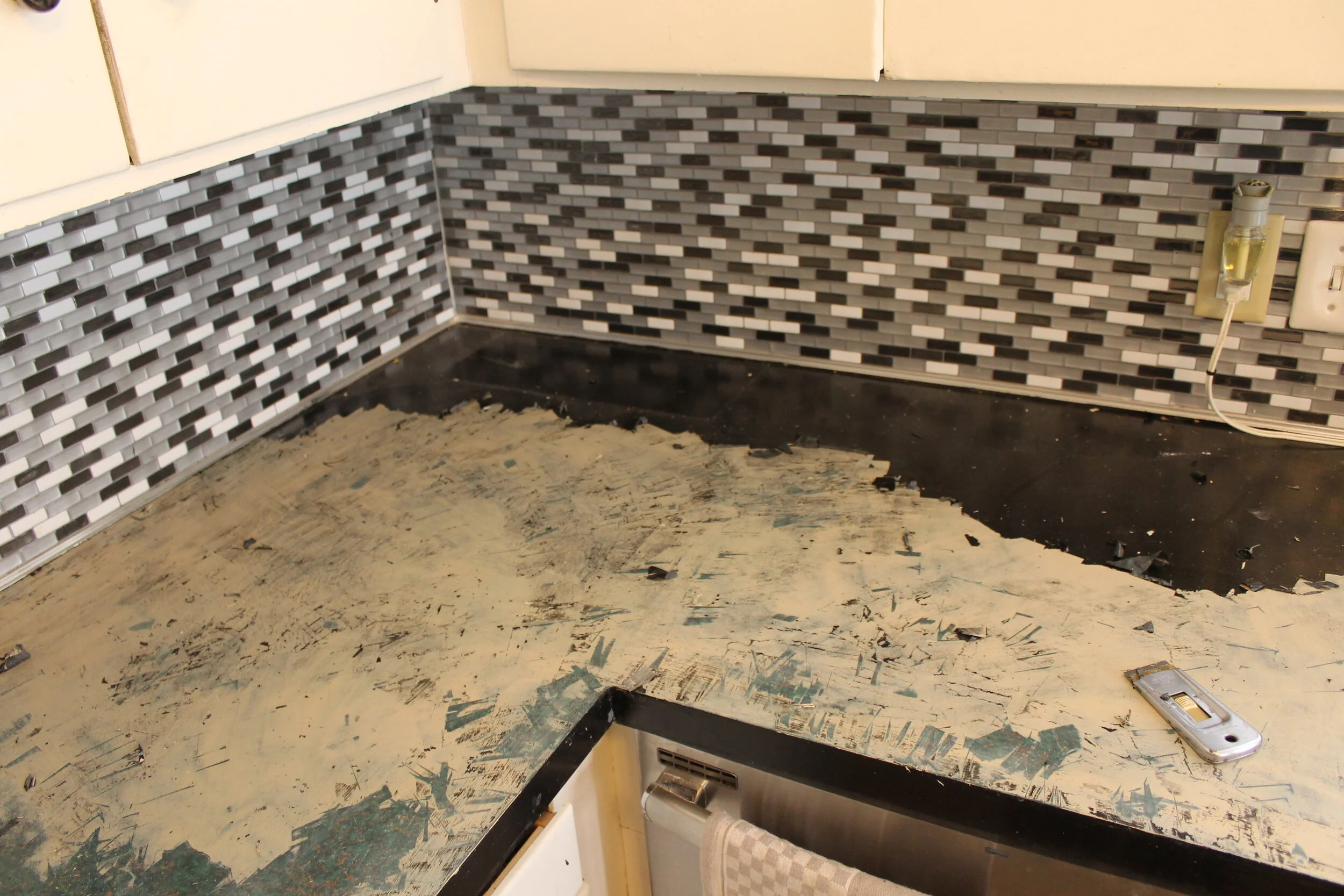  Old painted finish being removed 