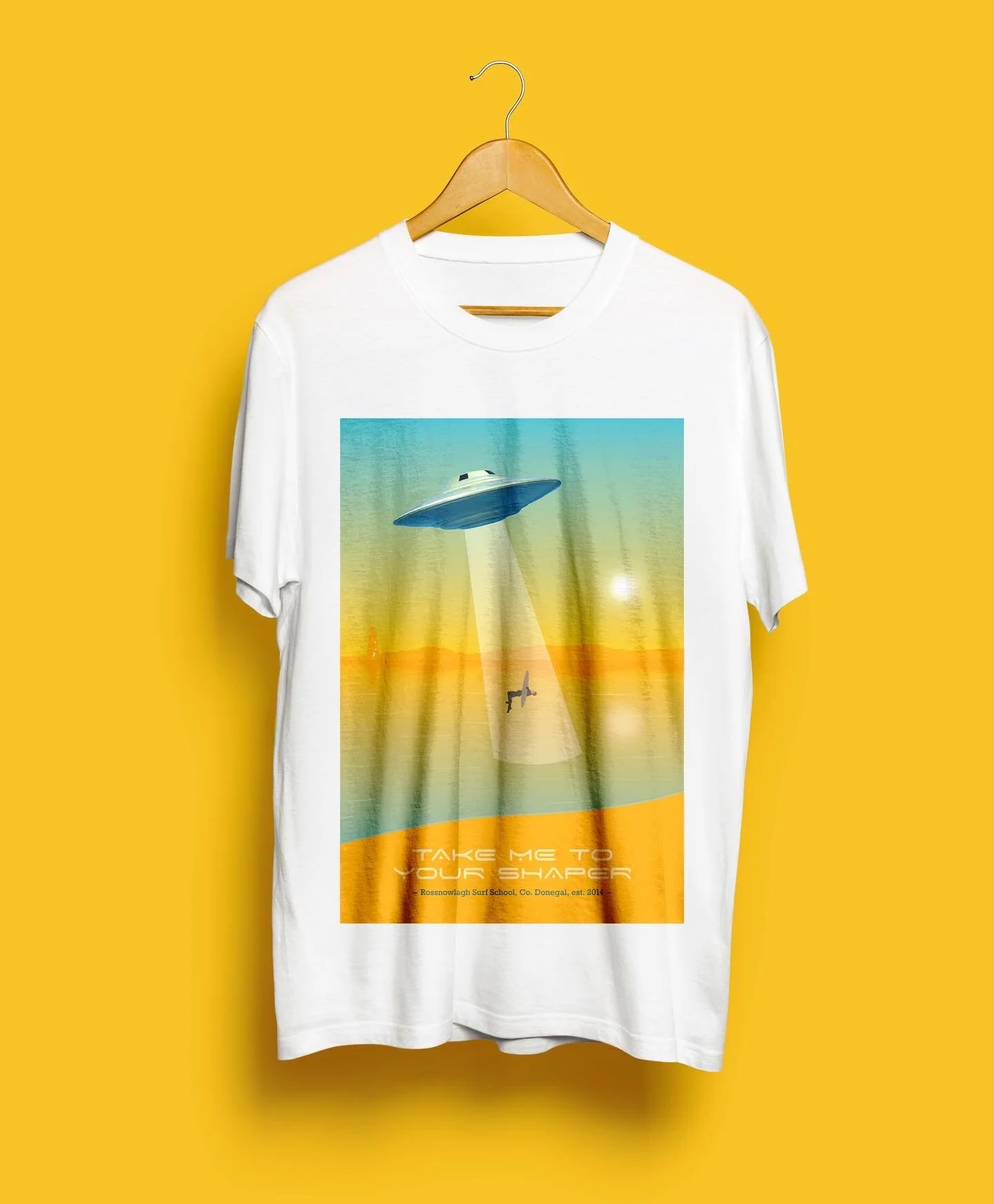 A t-shirt I designed as part of a collaboration with Rossnowlagh Surf School, Donegal. This is based loosely on an illustration I created during Inktober 2020. James from RSS loved the original illustration, so I kept the ufo and abductee, but adapt…