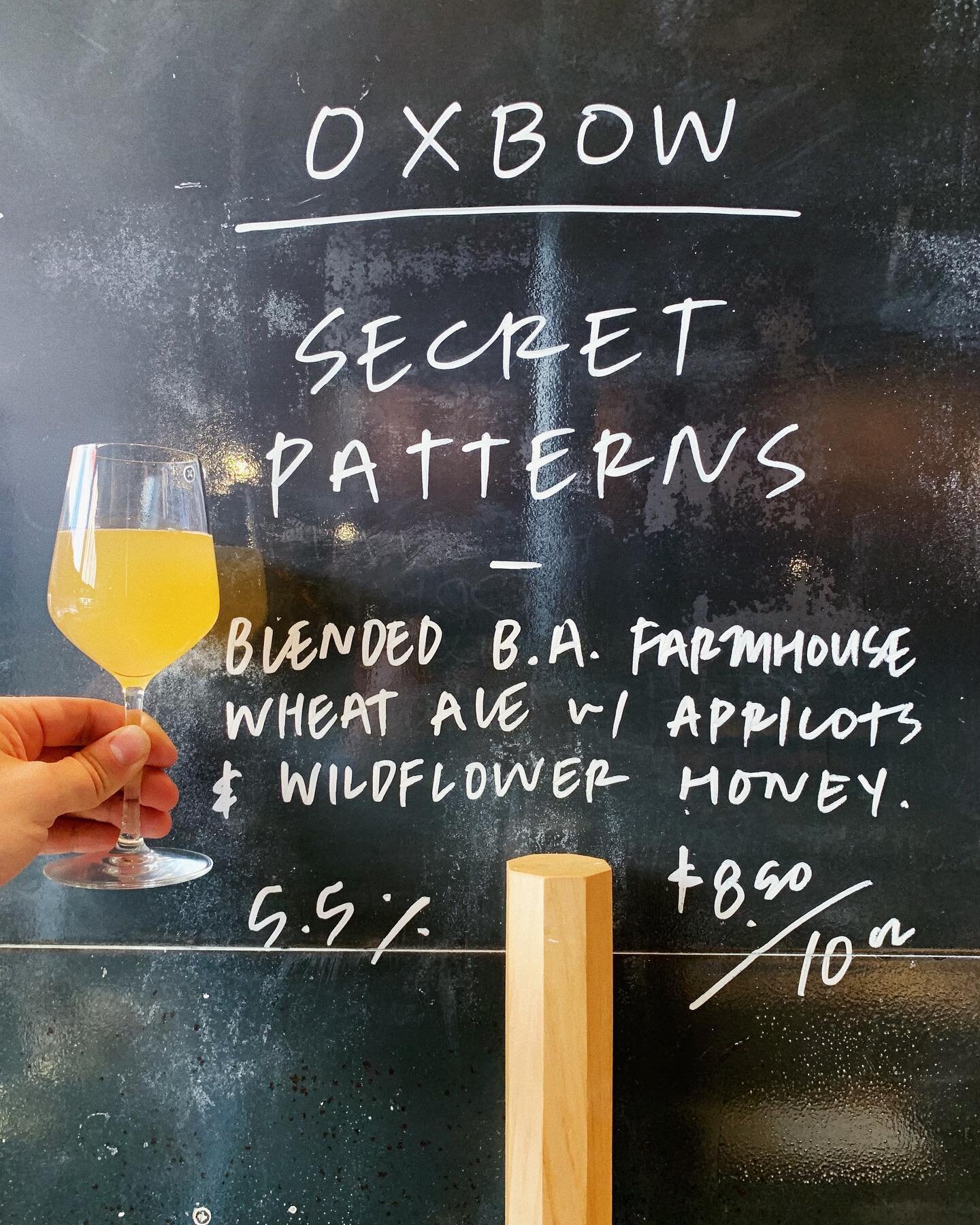 Tapped our last keg from @oxbowbrewingcompany (for now)! Secret Patterns is a blend of mixed-ferm farmhouse ale and barrel-aged farmhouse wheat ale, aged on apricots with Maine wildflower honey. ⁣
⁣
All this to say: you should stroll down on this sun