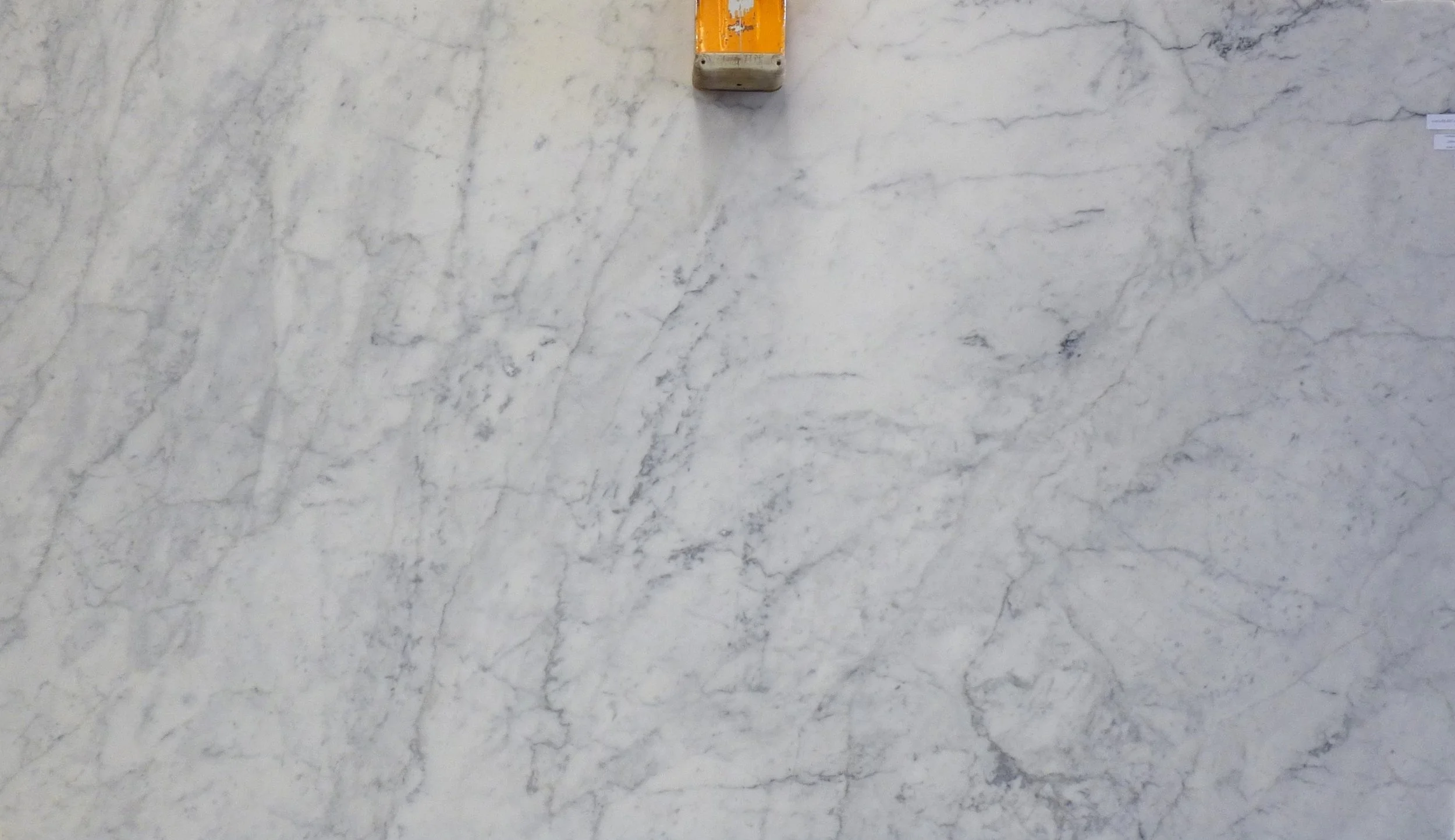 A slab of Carrara C-0125 20mm honed