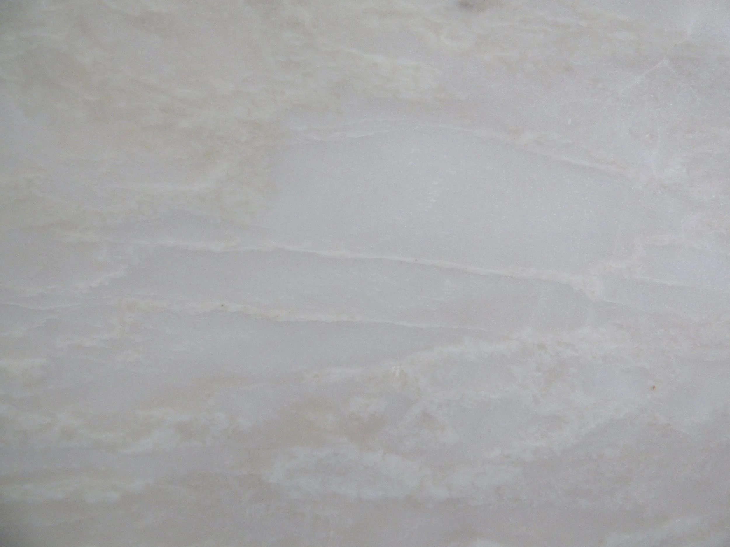 Close up of Namibia White 20mm honed NW-0225