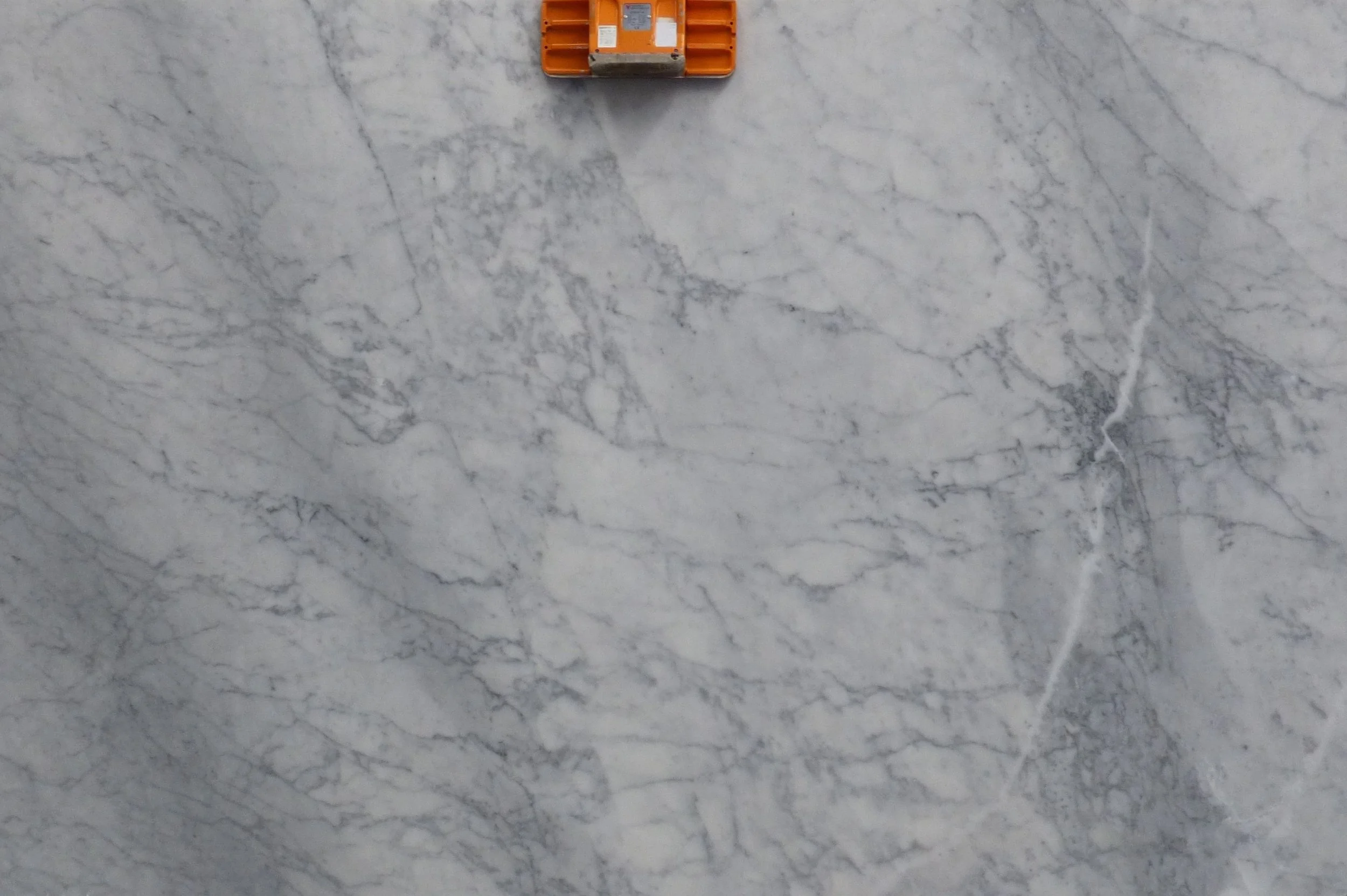 A slab of Carrara C-0724 20mm honed