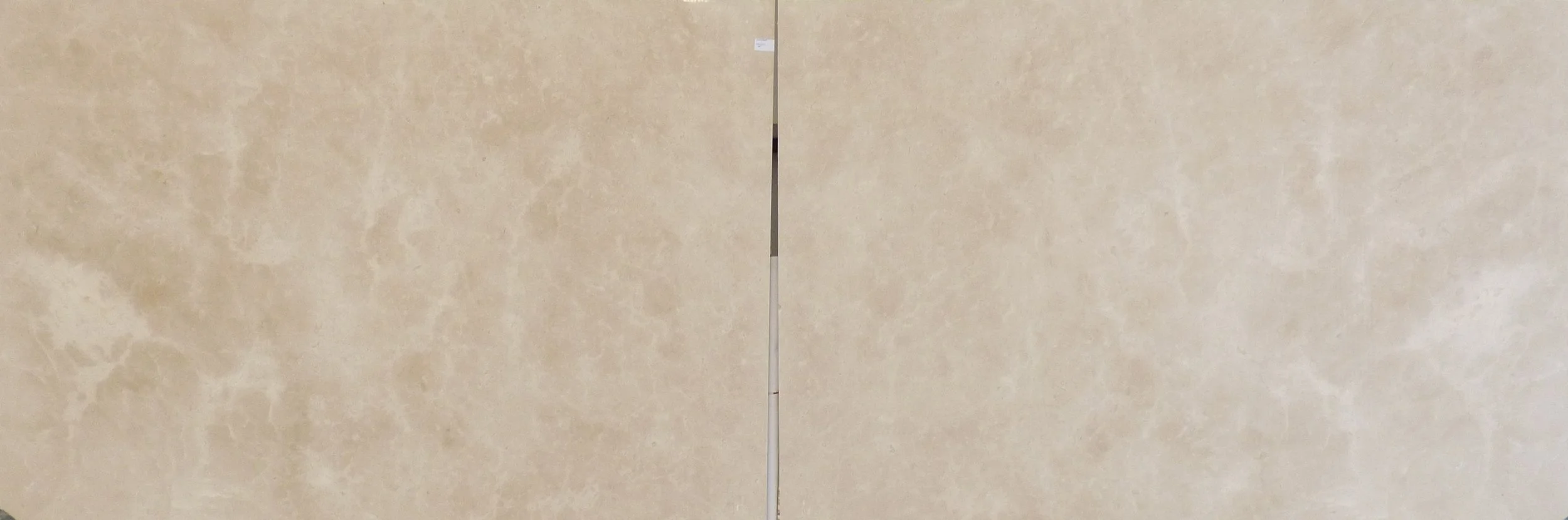 Crema Marfil bookmatched slabs