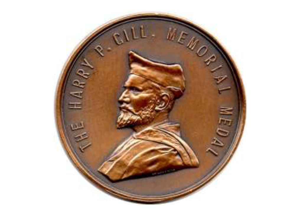 Front face of Harry P Gill Medal, South Australian School of Art, University of South Australia. This medal is awarded annually to the student at the South Australian School of Art with the highest grade point average in the field of Design. The medal depicts Harry Pelling Gill in academic dress as an Associate Member of the Royal College of Art (ARCA) London, a position he claimed after 1899.