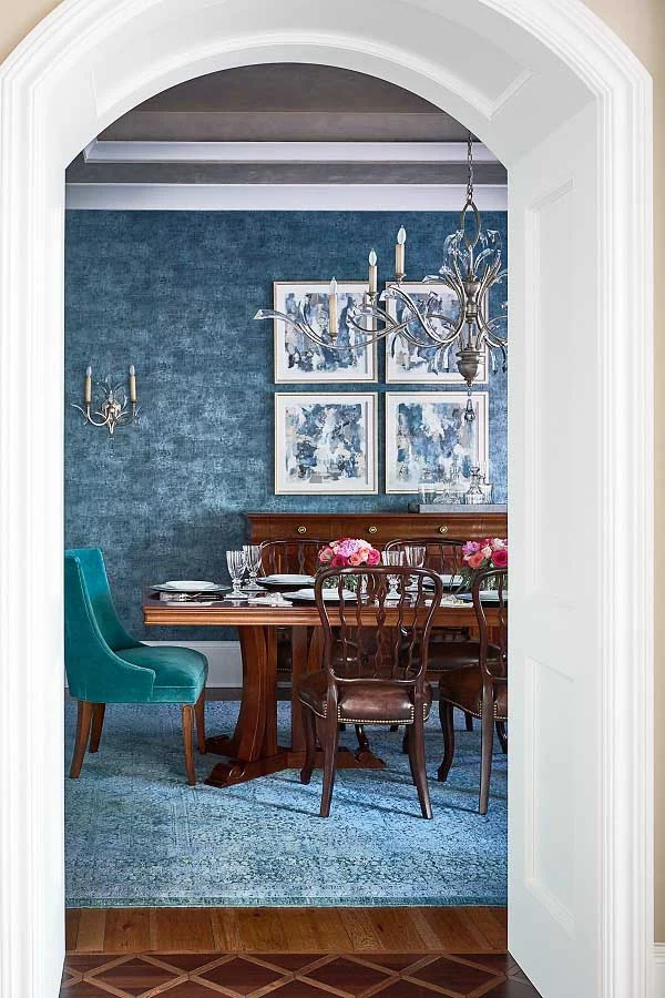 I love how the archway to this dining room creates another frame, of sort. Artist: Vesela Baker - Commissioned multi-media pieces for a lake home dining room. Interior Design: Wanda S. Horton Photography: Dustin Peck (Image Copyrighted)
