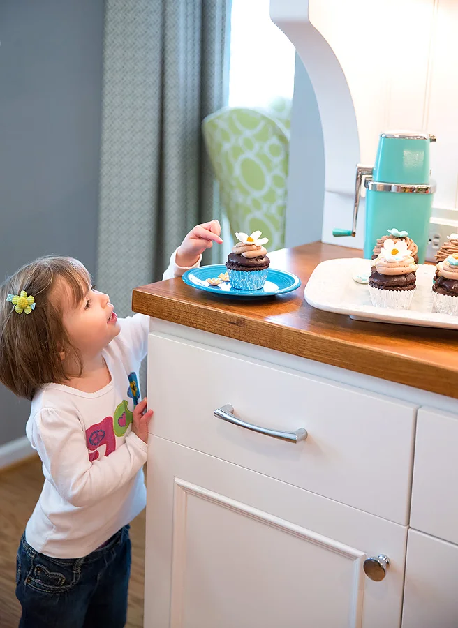 A few years ago, we updated an awkward condo kitchen with a retro vibe and better storage. An easier reach for cupcakes, too! I remember it being a fun project and then also recall we had to go through a few cantankerous contractors to get to the prince we now have. Thankful that we're still working with this family, today!