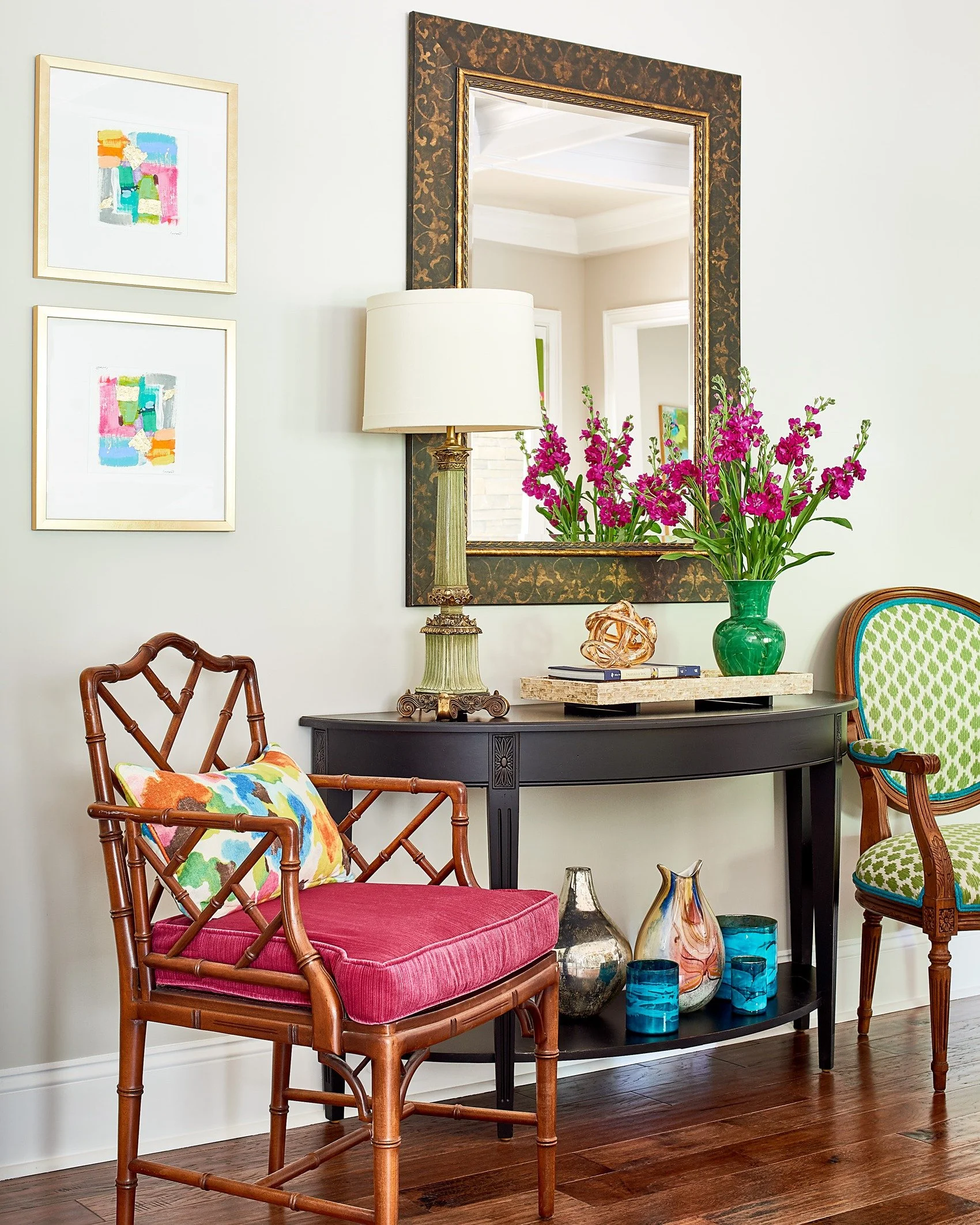 Just about everything in this photo had a previous life in a different home. The chairs were recovered in fresh fabrics, and a few, vintage glass pieces were sourced to keep the color story going. So cheerful!

Not long ago, another client shared tha