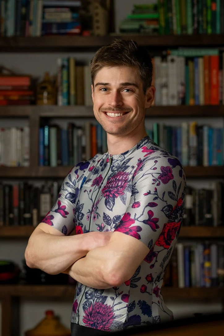 Person identified as Peter Olejniczak has short hair and is wearing a bike jersey.